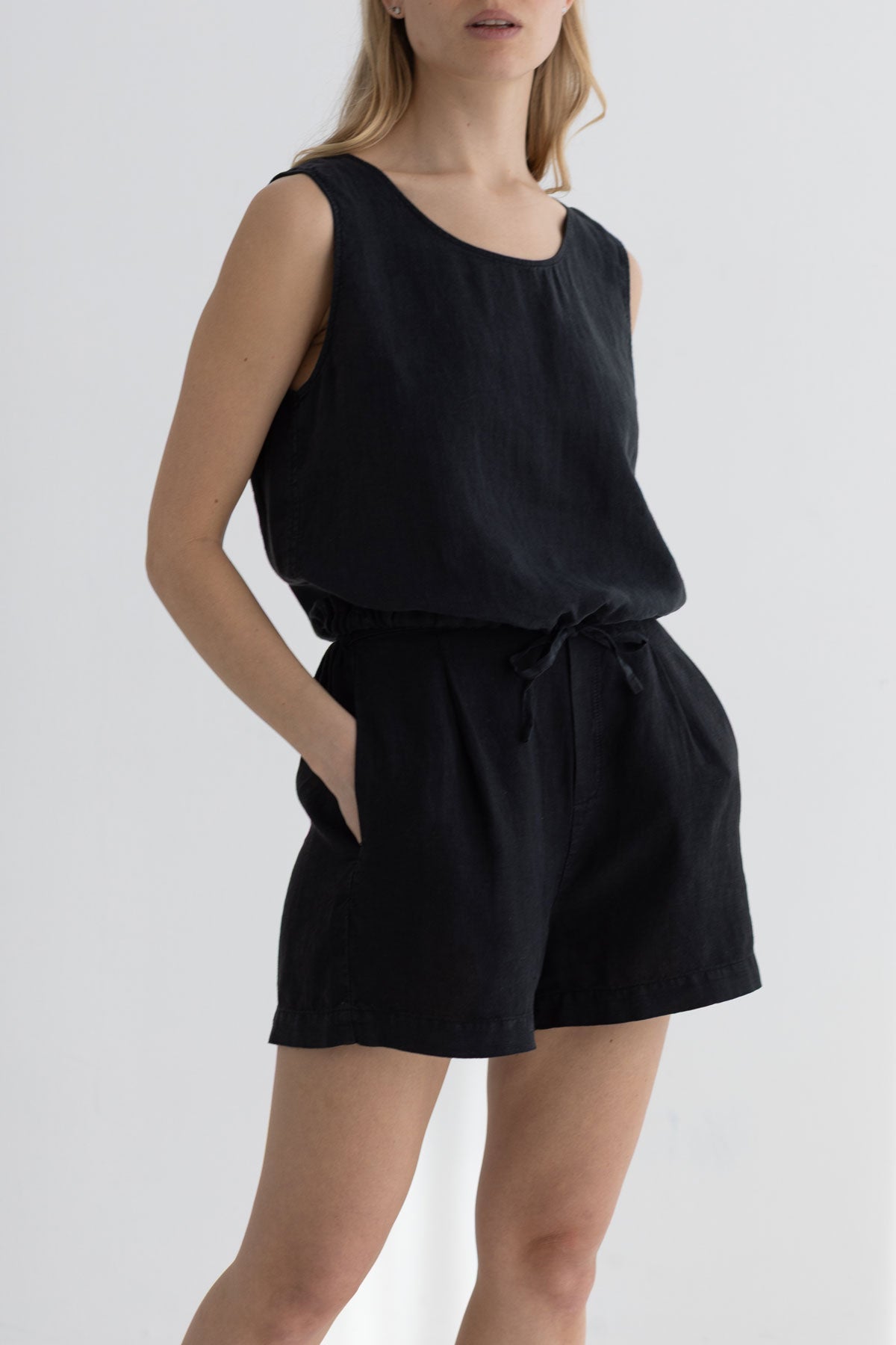 Black linen shorts women black shirt wear view front