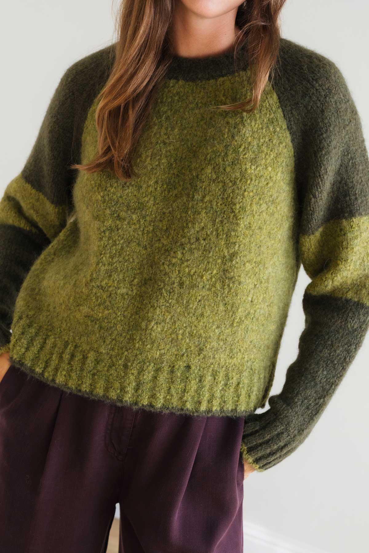 Eco-friendly olive knit with contrast sleeves