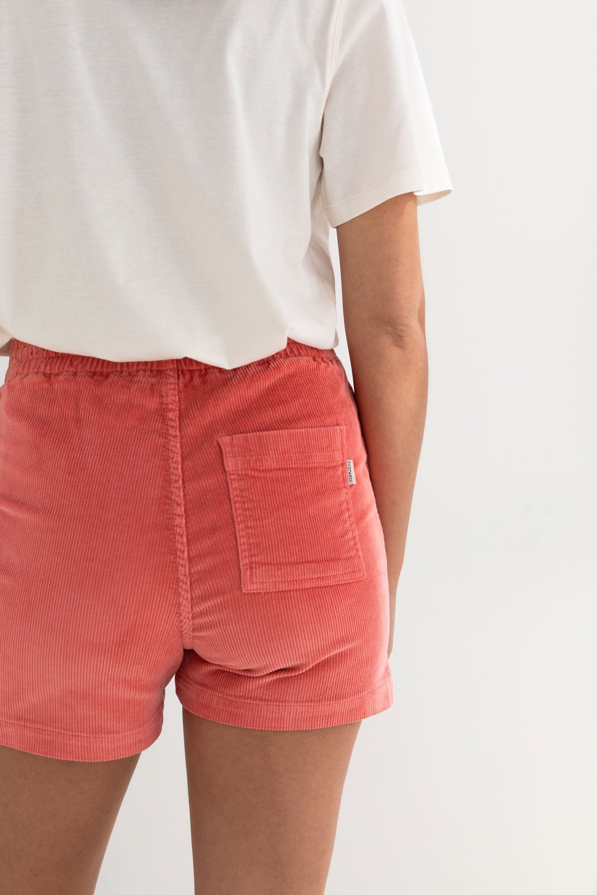 Off white cotton top women coral shorts detail back