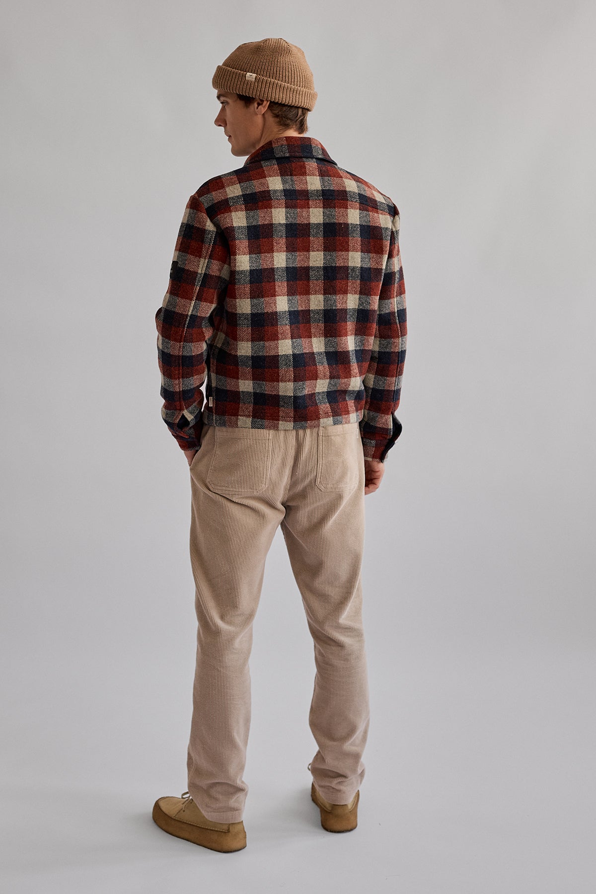 jacket with chequered red, navy, and beige pattern