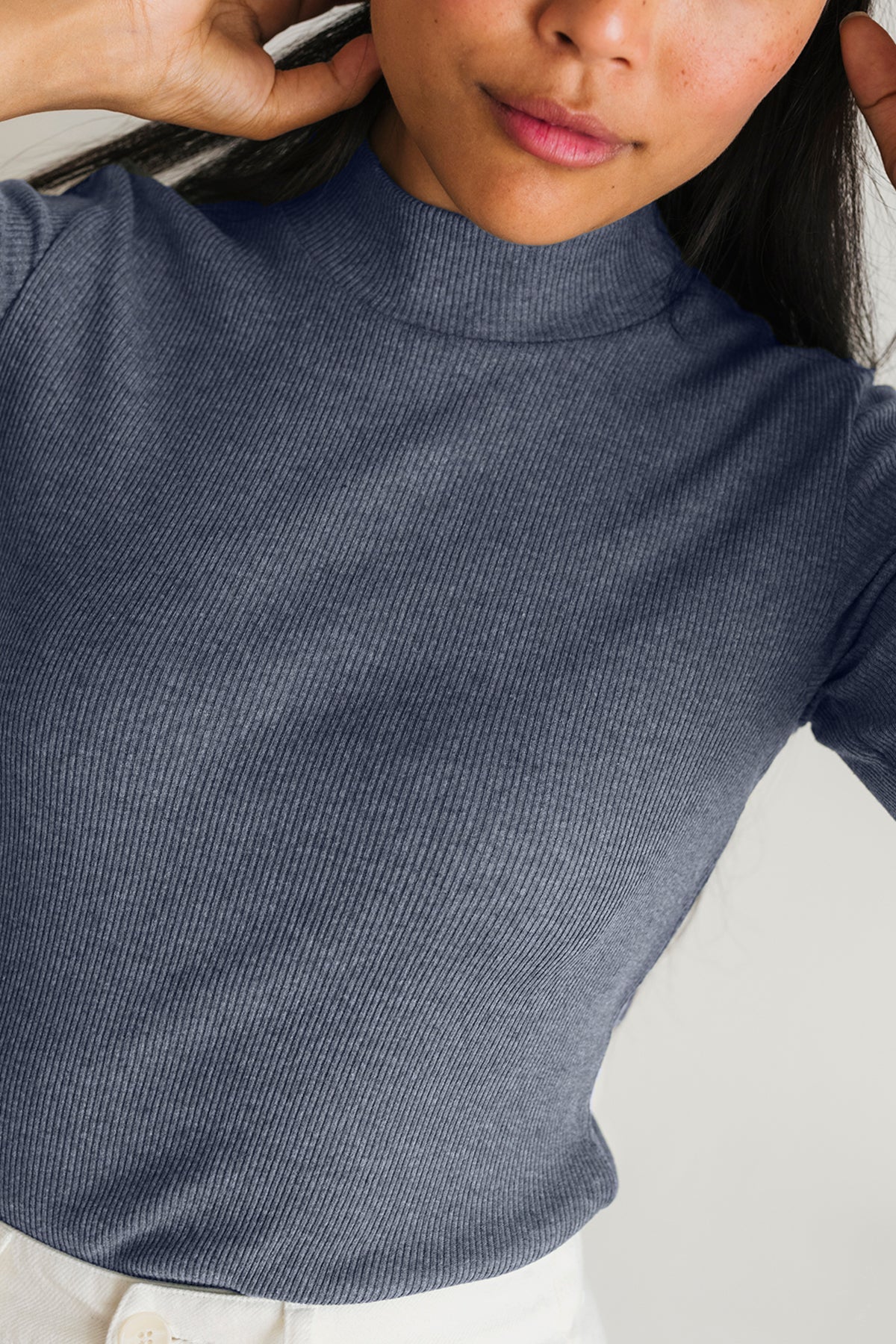 slim-fit blue top with vertical rib texture