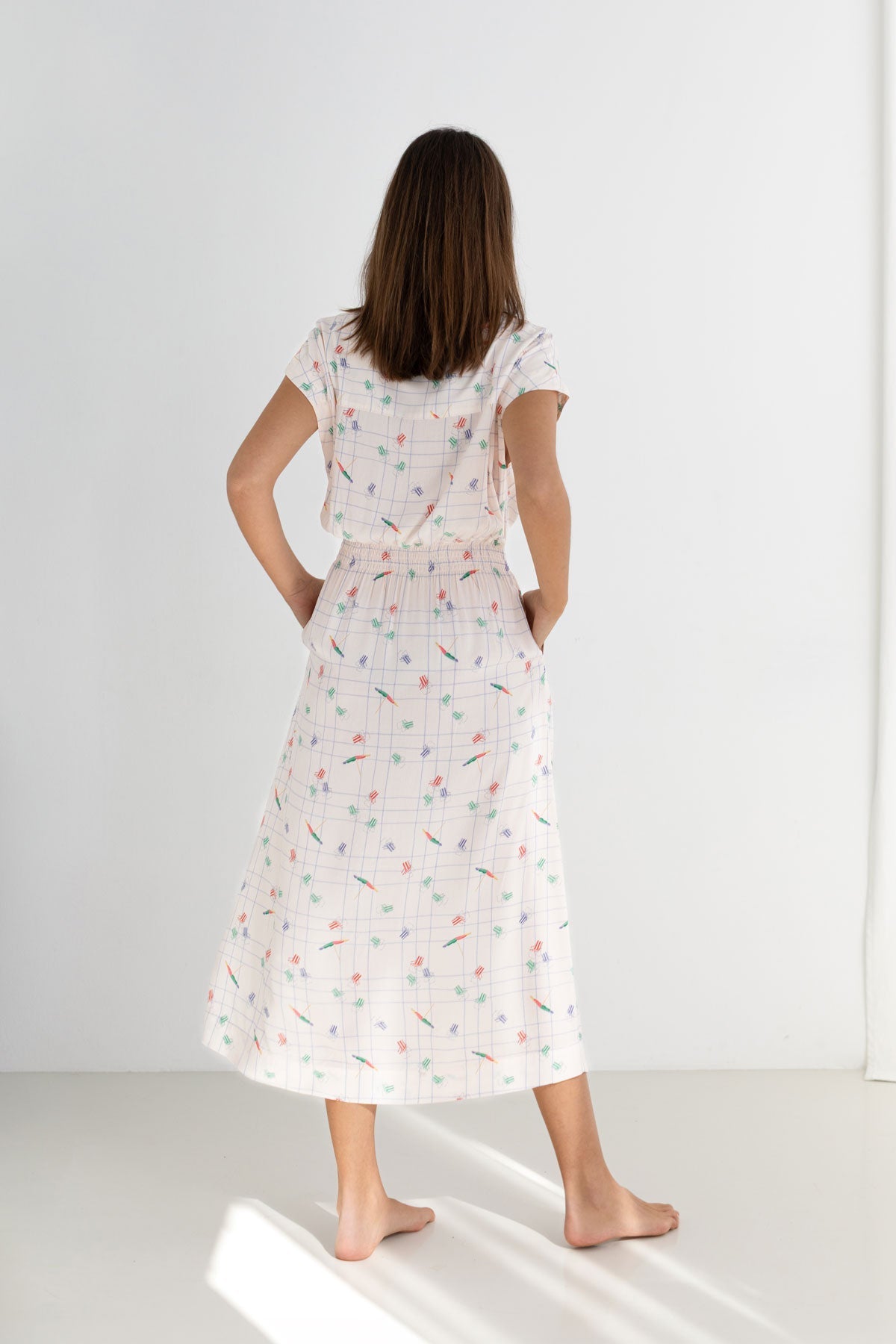 Patterned beige viscose dress women full body view back