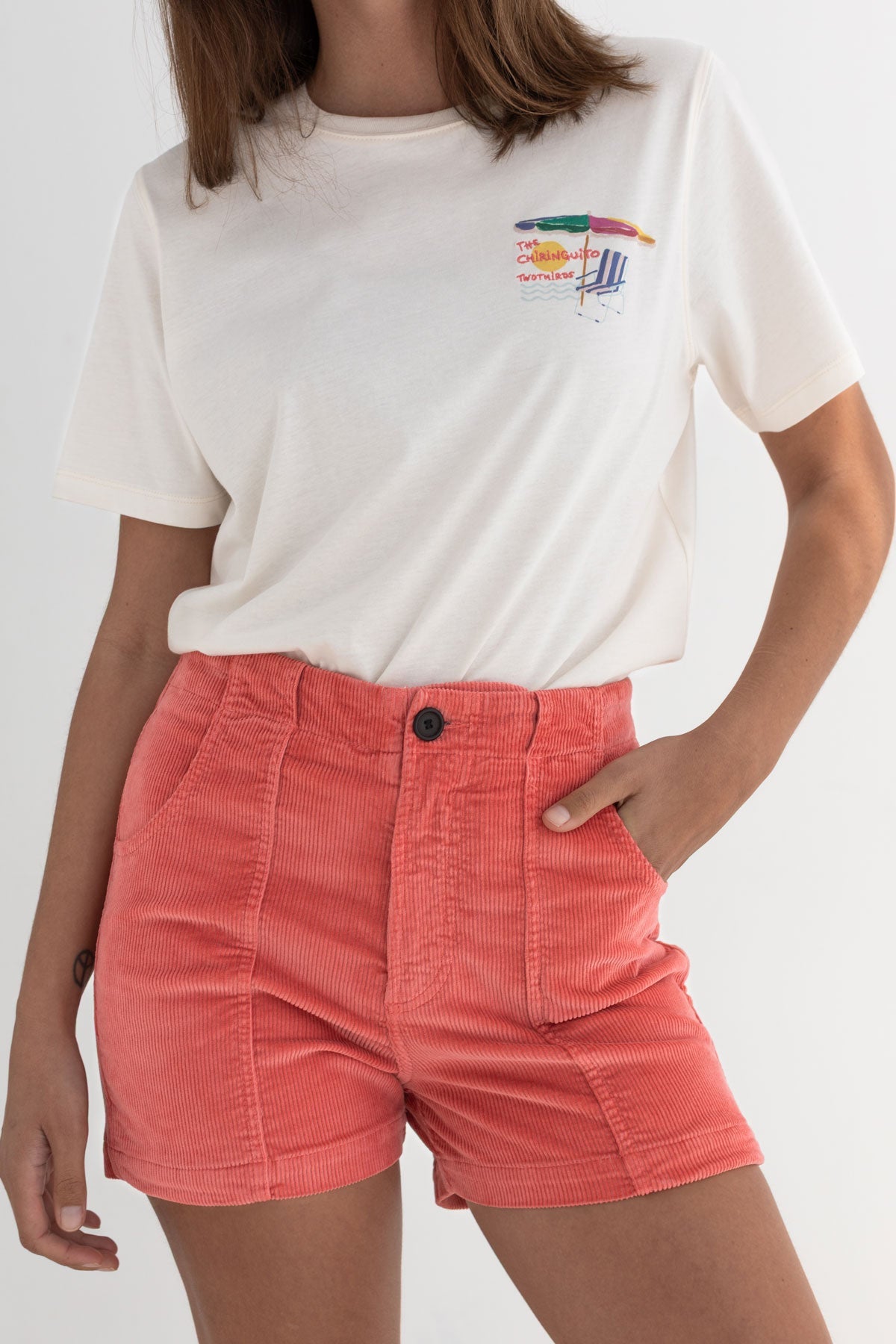 Pink corduroy shorts women off white tshirt wear view front