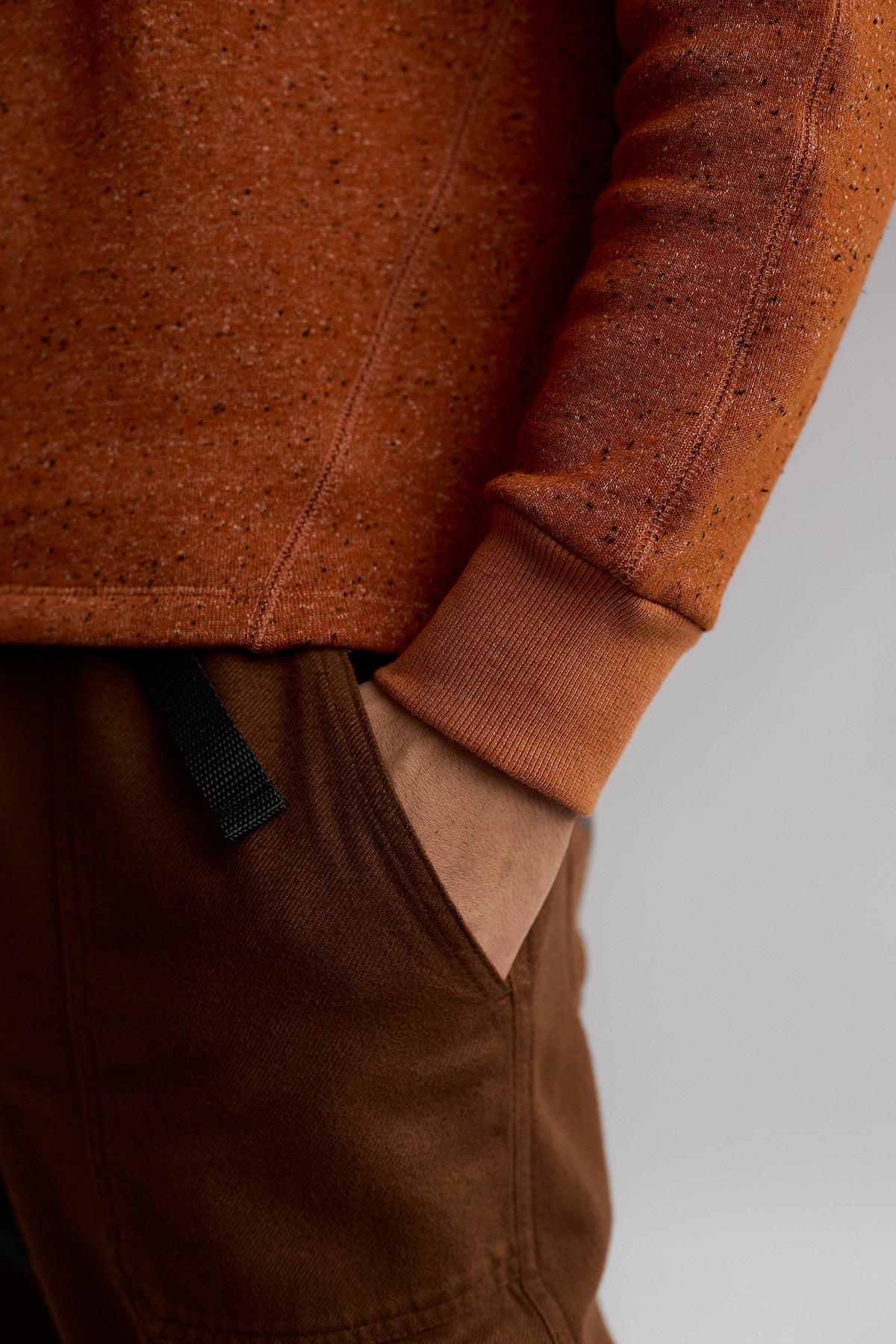 soft sustainable orange sweater with tapered seams