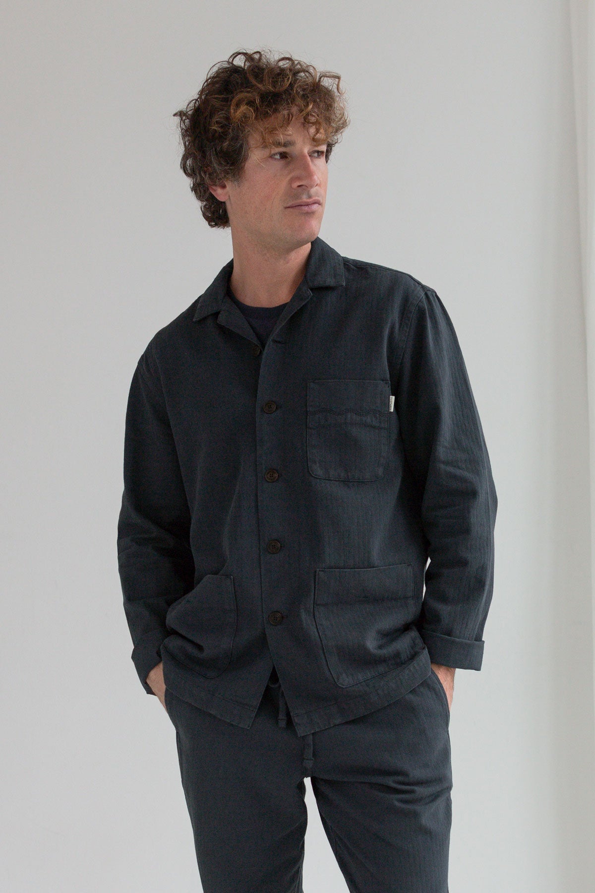 Dark navy organic cotton jacket men navy pants wear view front