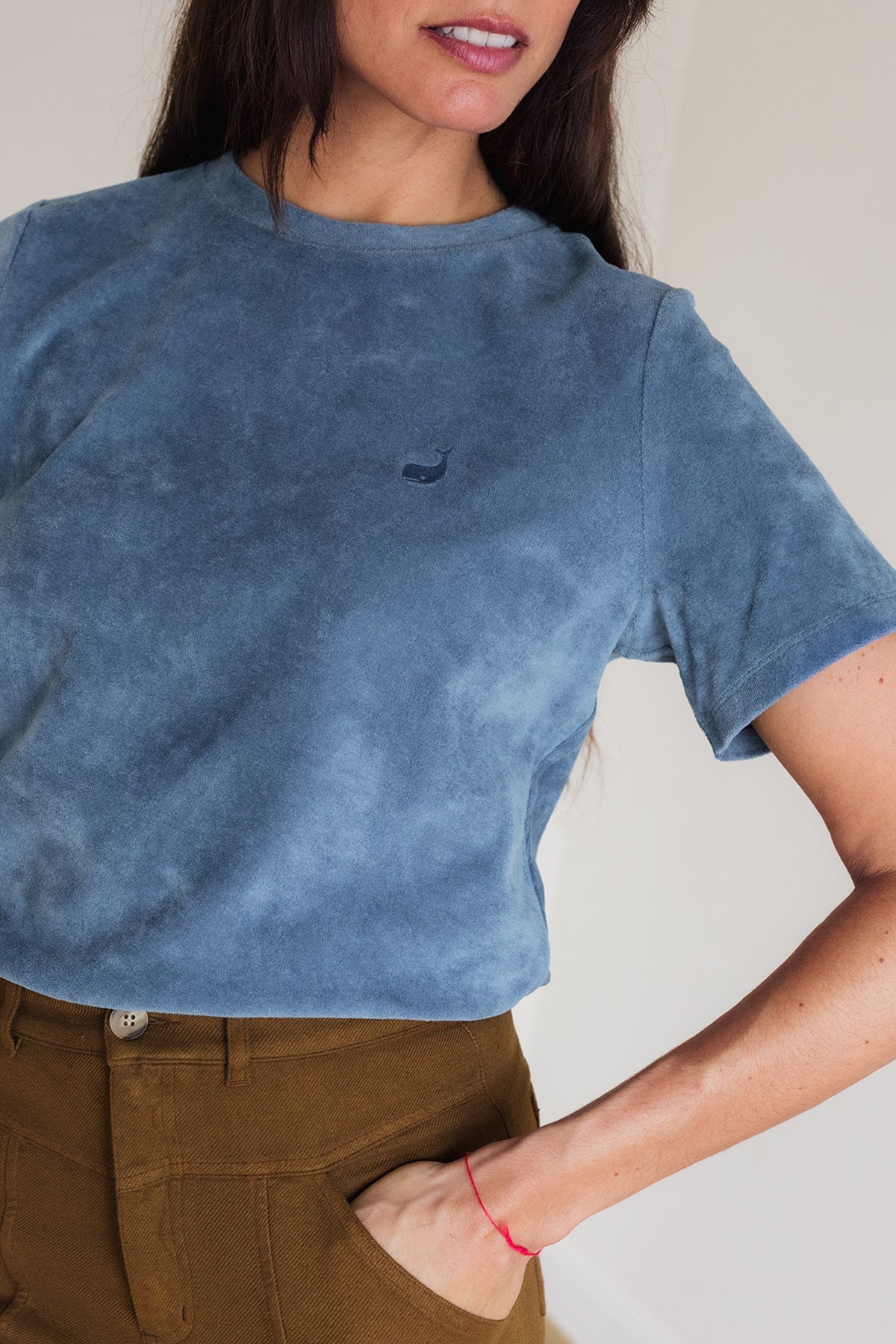meta-preview, Sustainable women’s blue top with whale embroidery