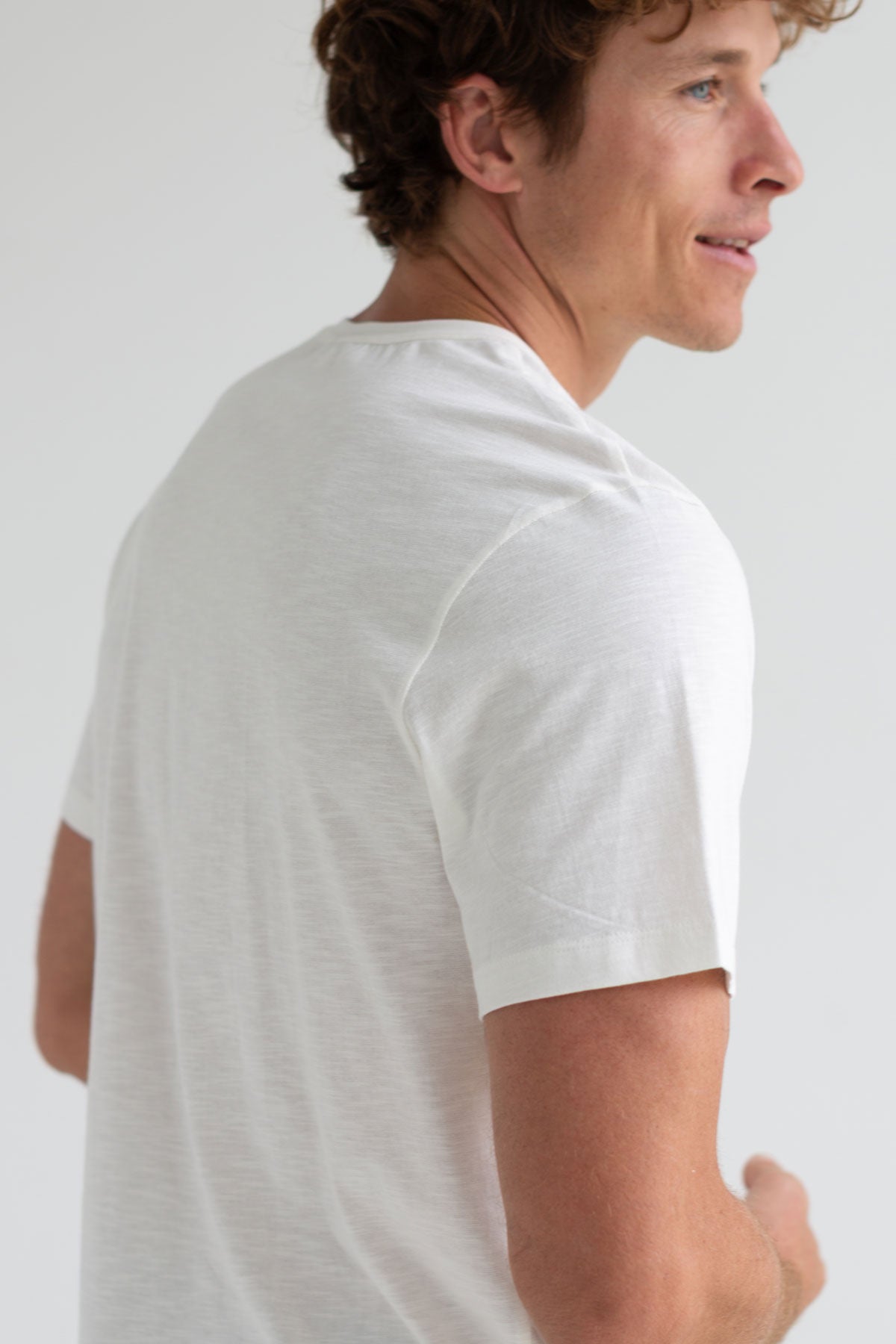 Off white round neck tshirt men green pants wear view back