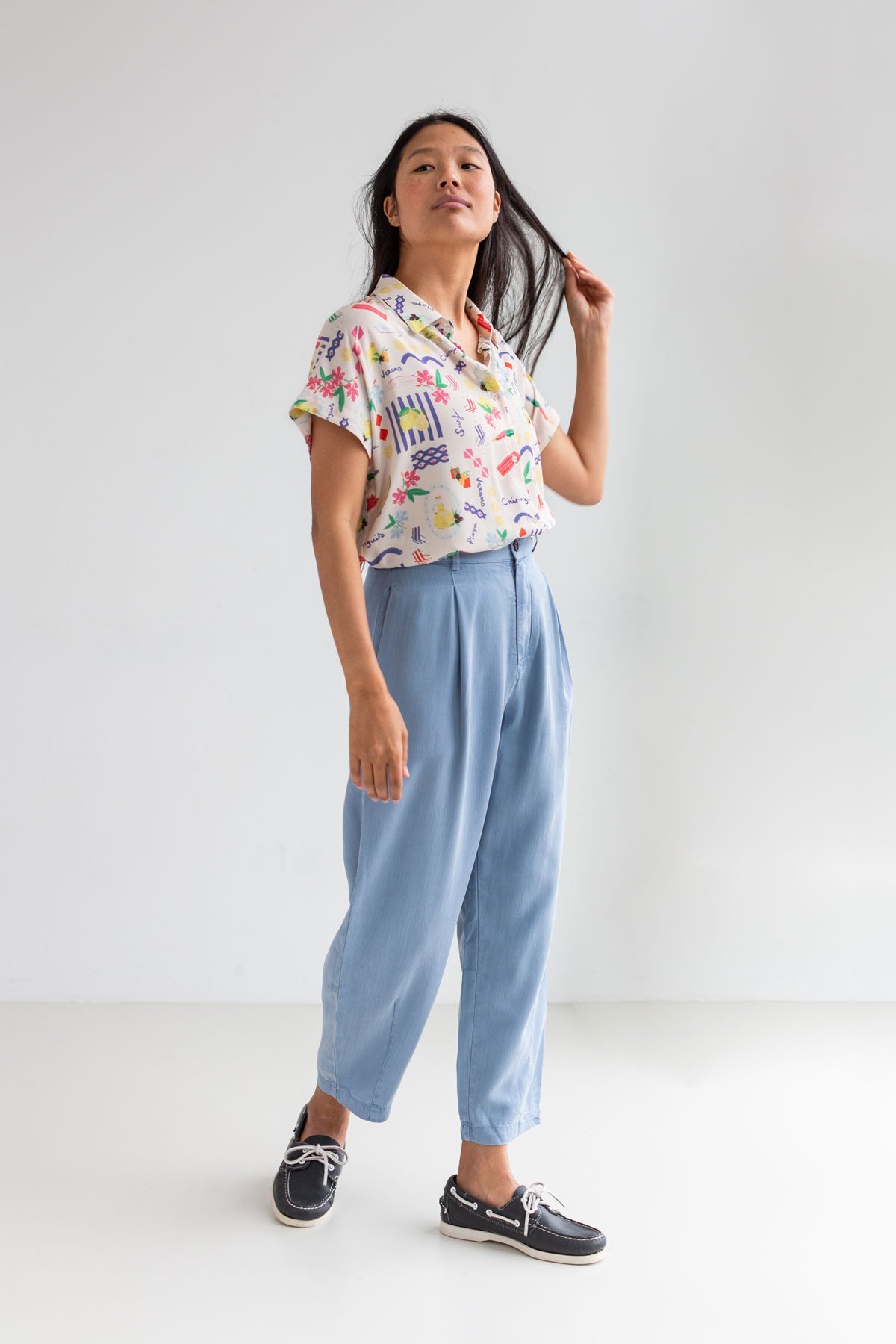 Patterned light weight shirt women light blue pants full body view front