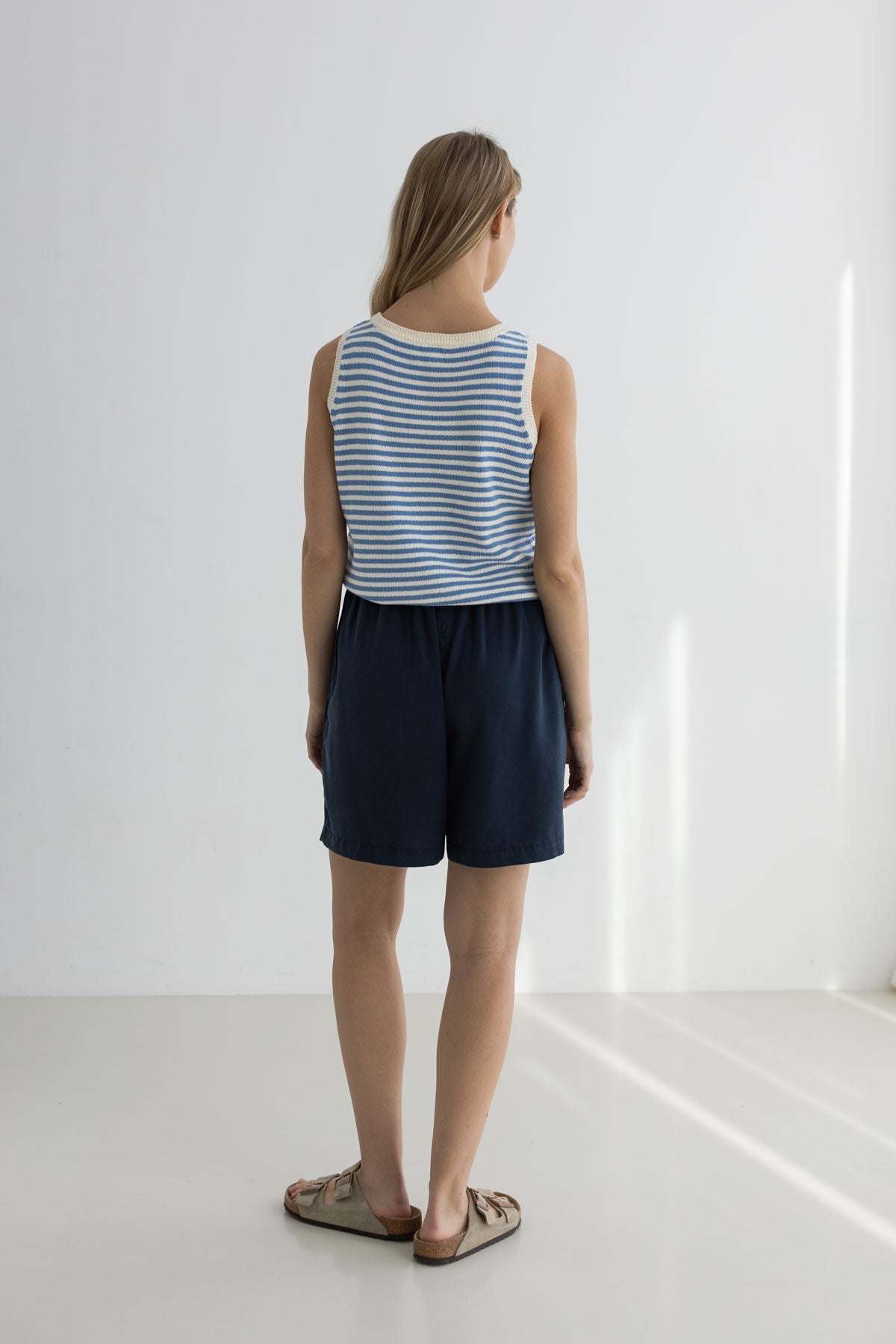 Denim blue stripes knit top women navy shorts full body view back