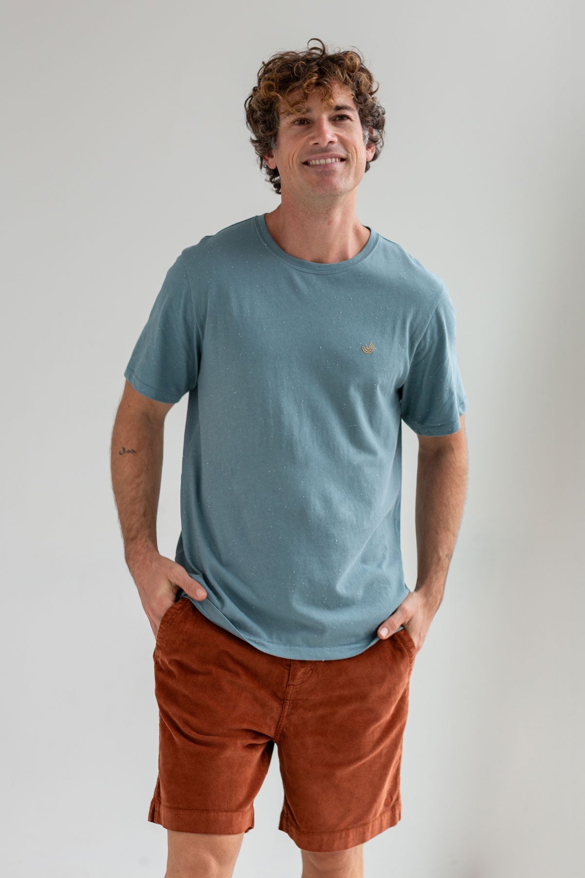 Coconut shell micro corduroy shorts men blue tshirt wear view front