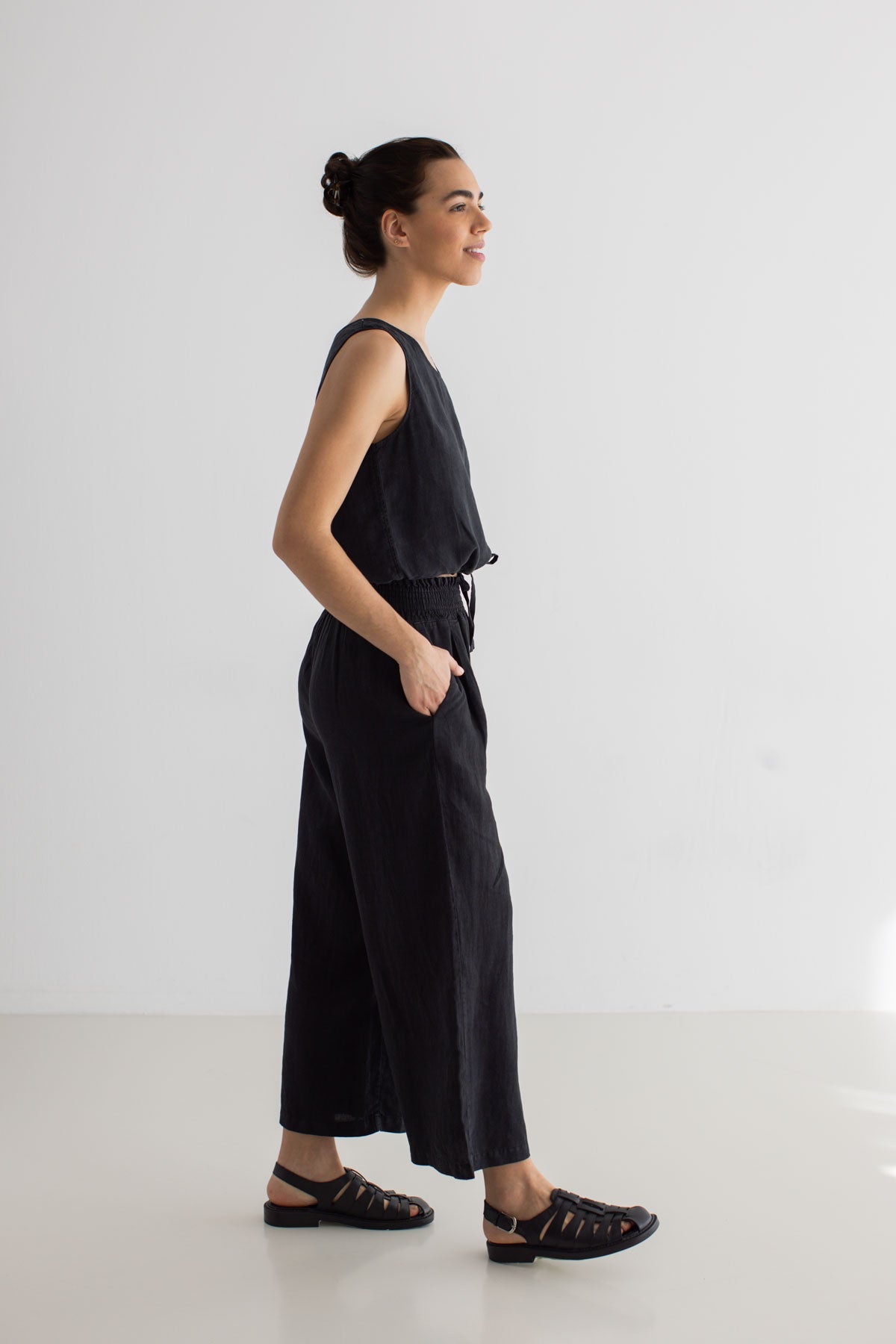 Black Sleeveless linen shirt women black pants full body view side