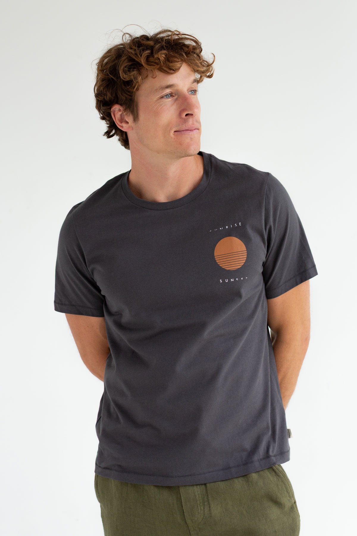 Dark sand roundneck t-shirt men light pants wear view front