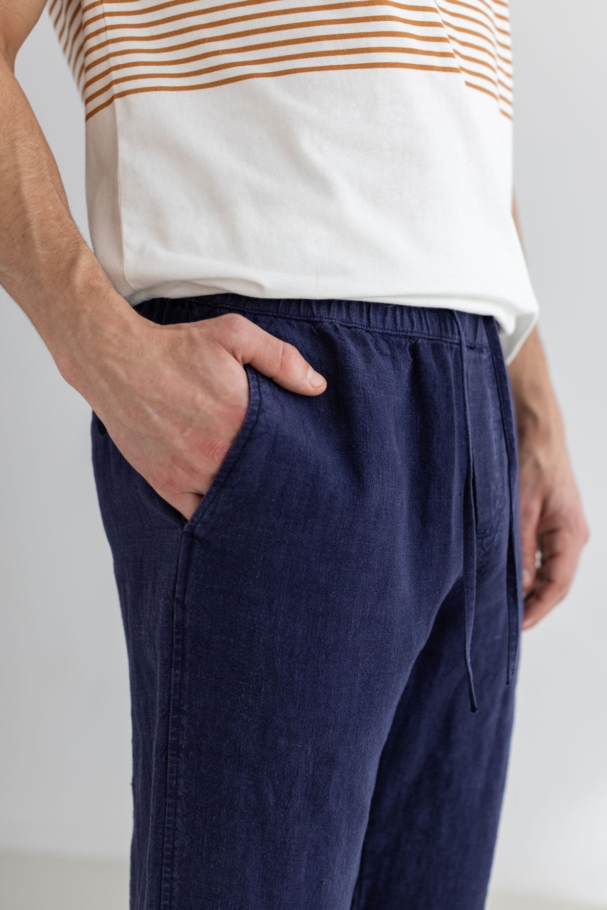 Navy blue heavy linen pants men striped tshirt detail front