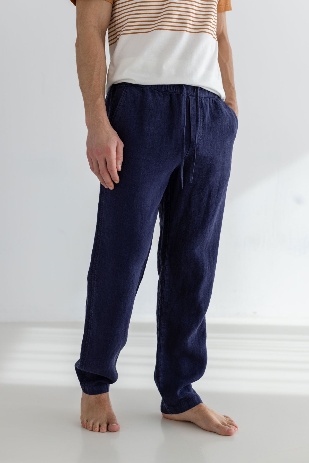 Navy blue heavy linen pants men striped tshirt wear view front
