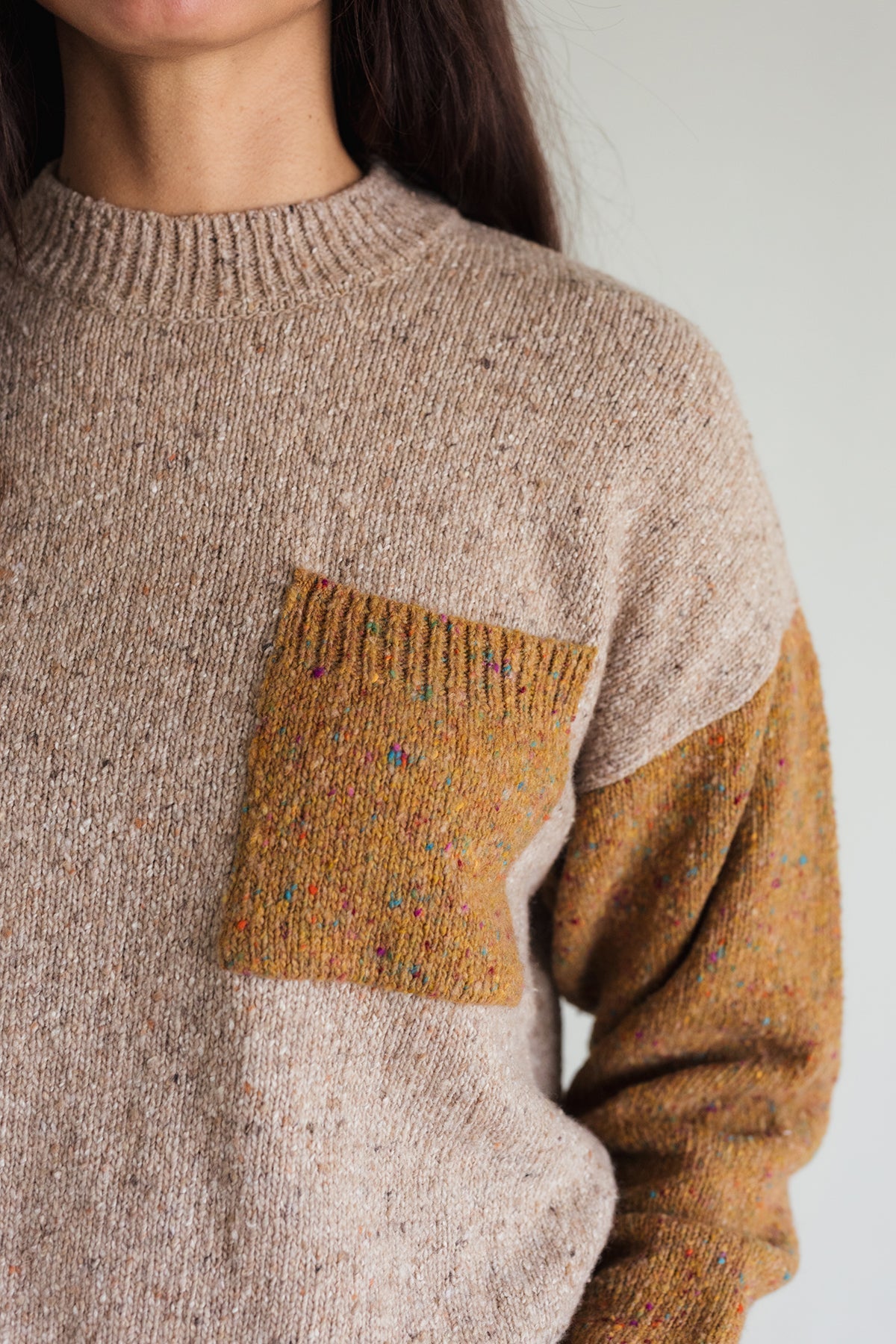 Two-tone recycled wool knitwear