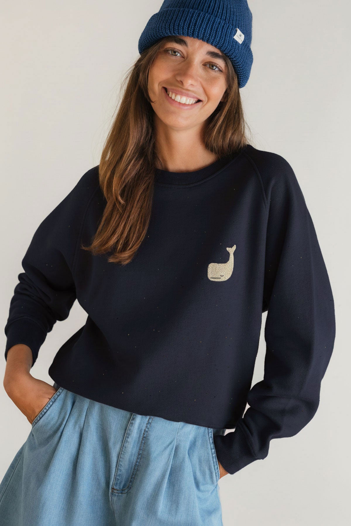 Navy organic cotton sweatshirt women light blue pants wear view front