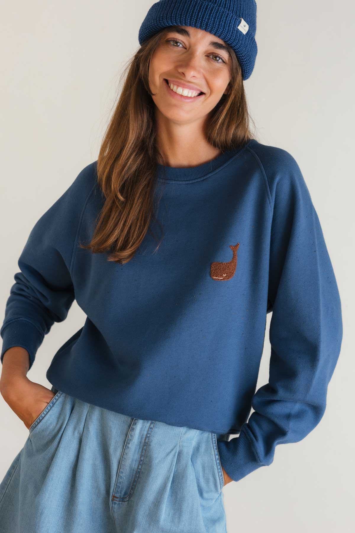 Minimal blue sweatshirt with small emblem