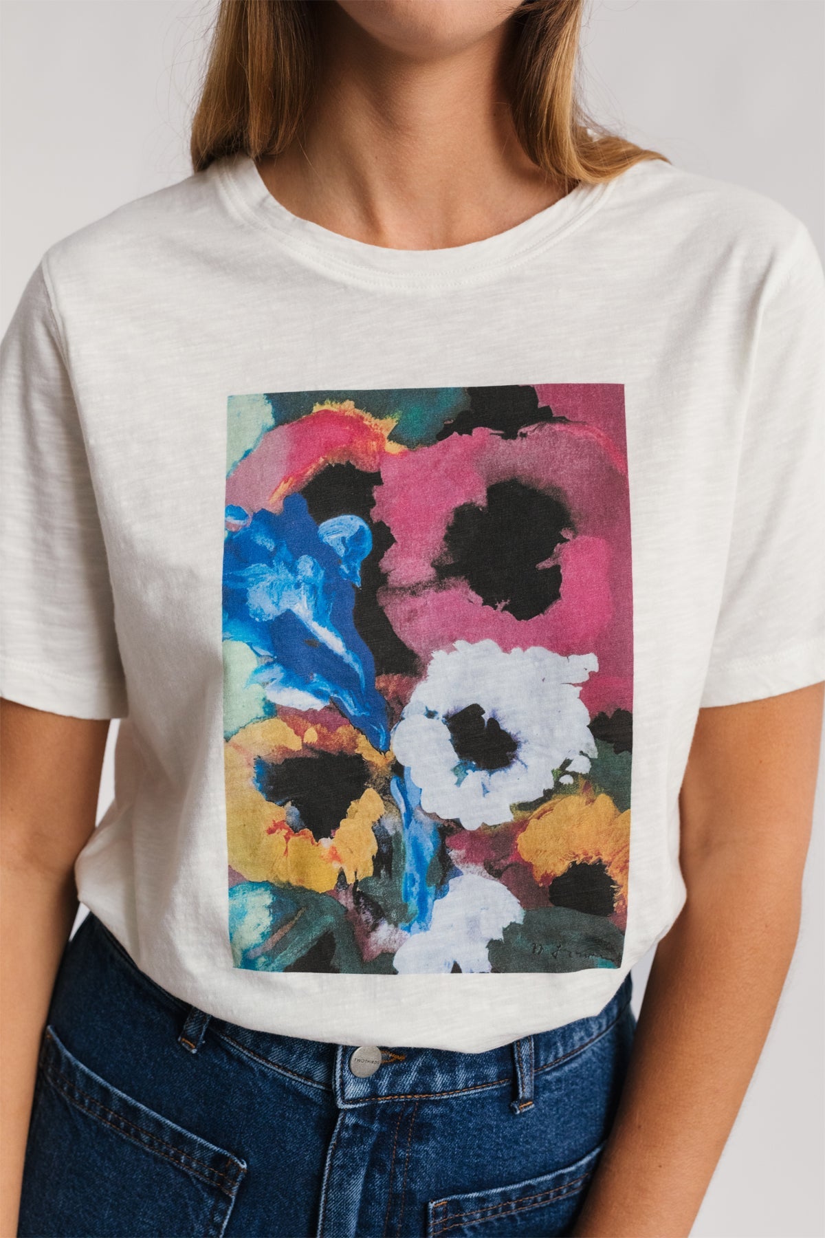close-up of the vibrant watercolour print organic cotton tee