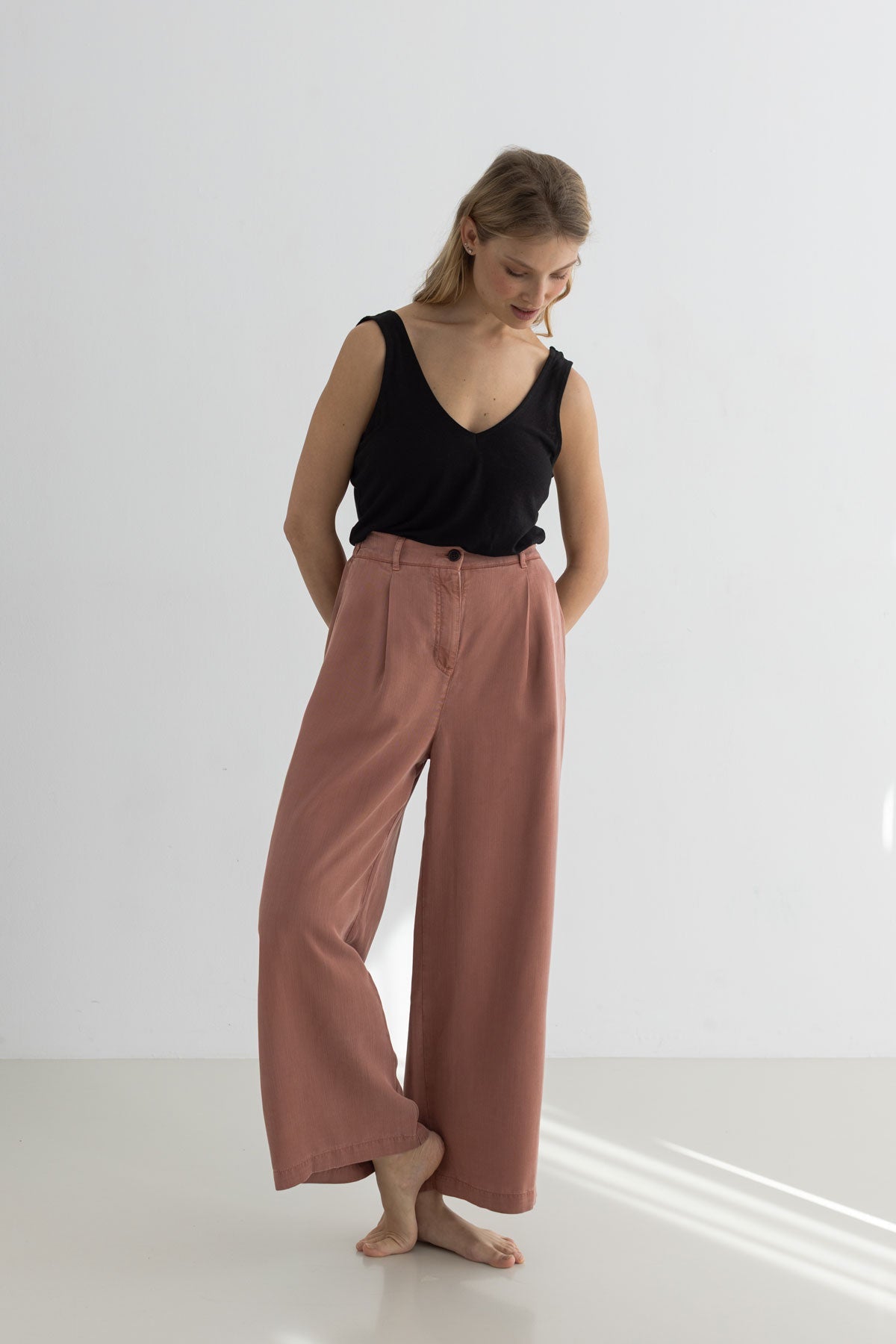 Adobe rose pants women black top women full body view front