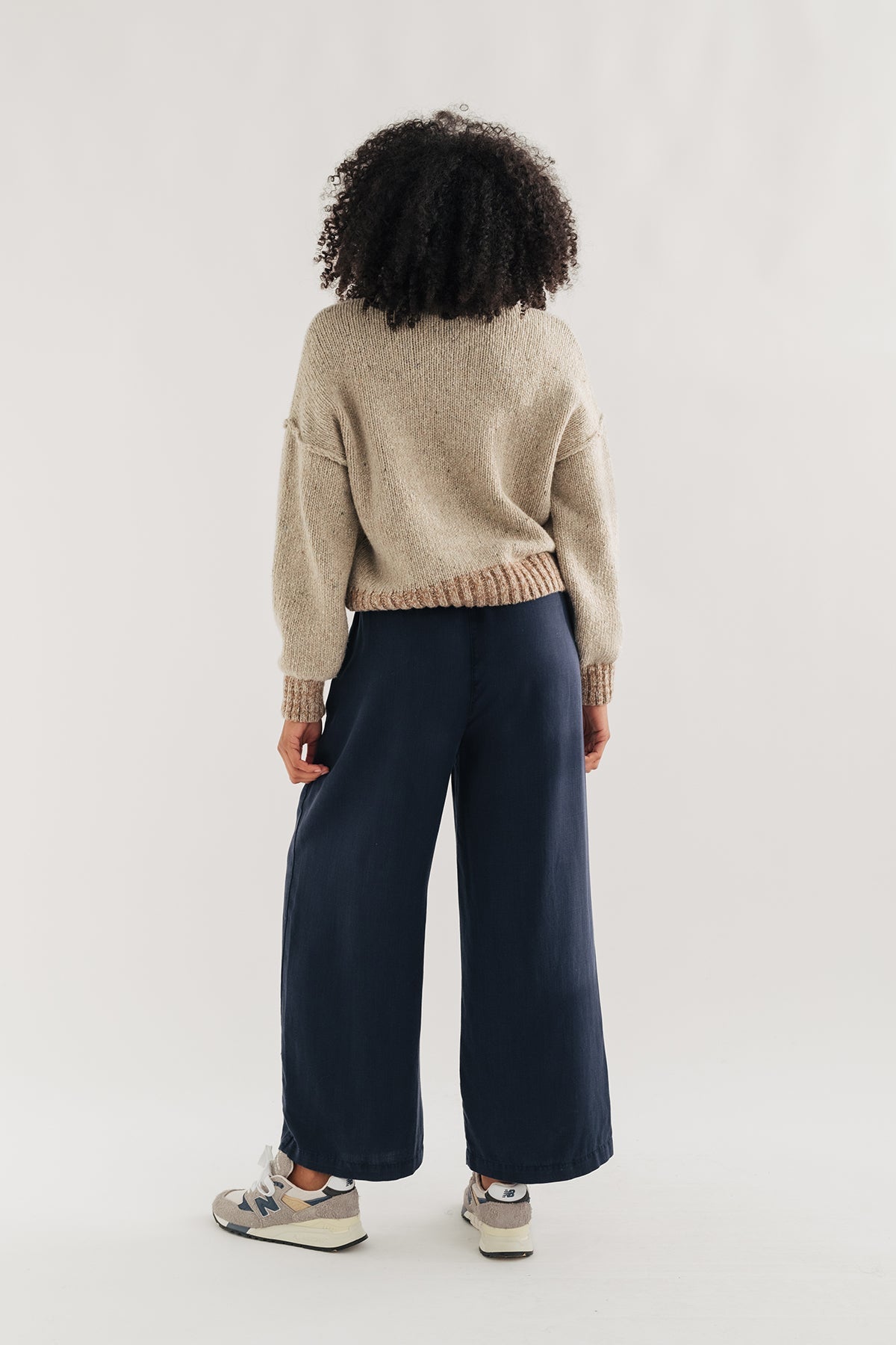woman wearing wide-leg blue pants