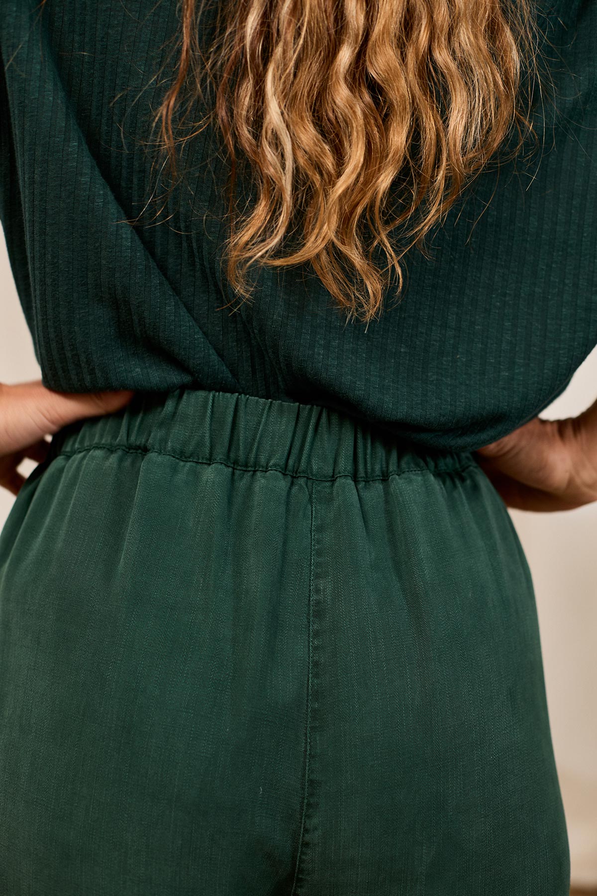 breathable green wide-leg pants with an elastic back waistband