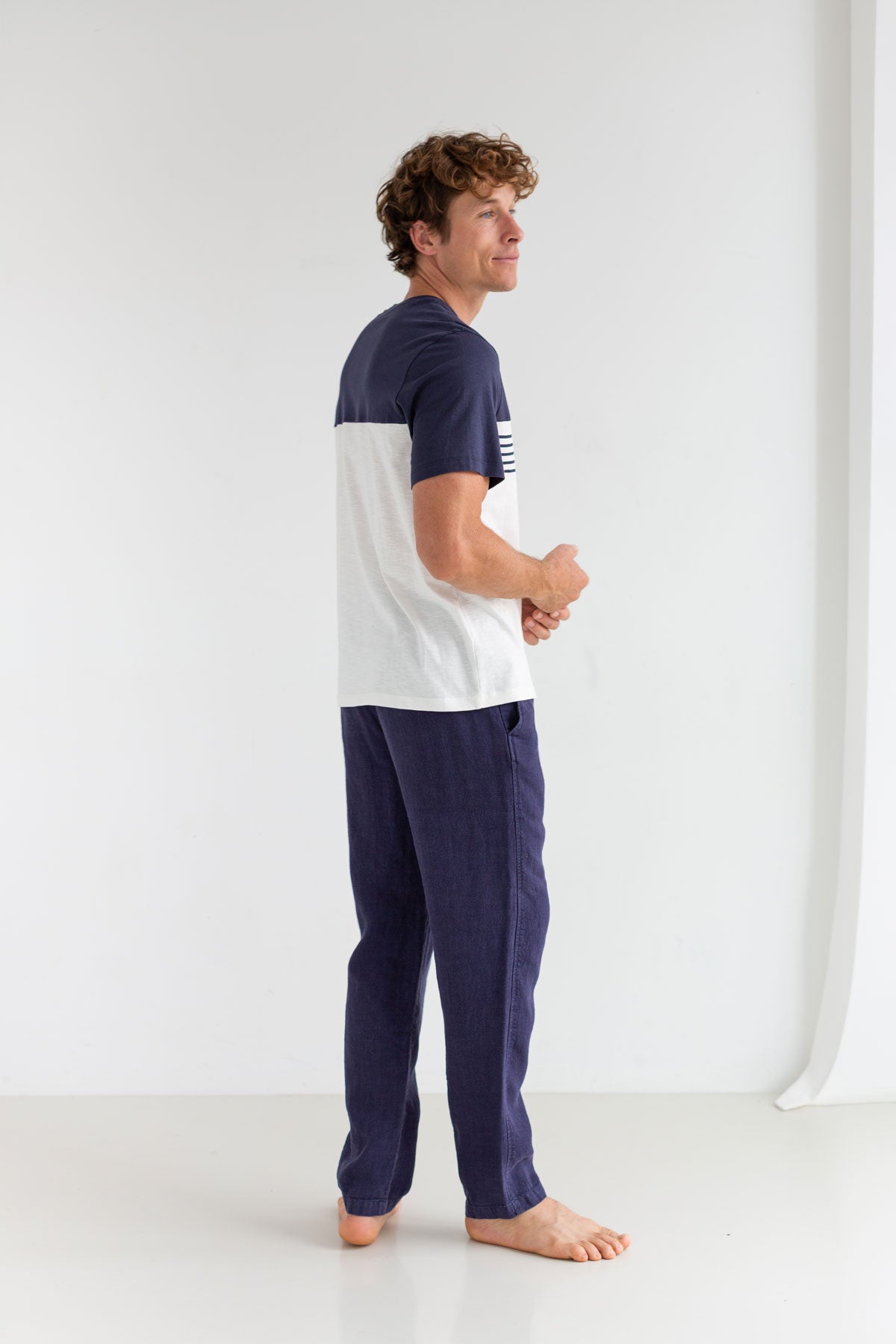 Navy round neck tshirt men blue pants wear view back