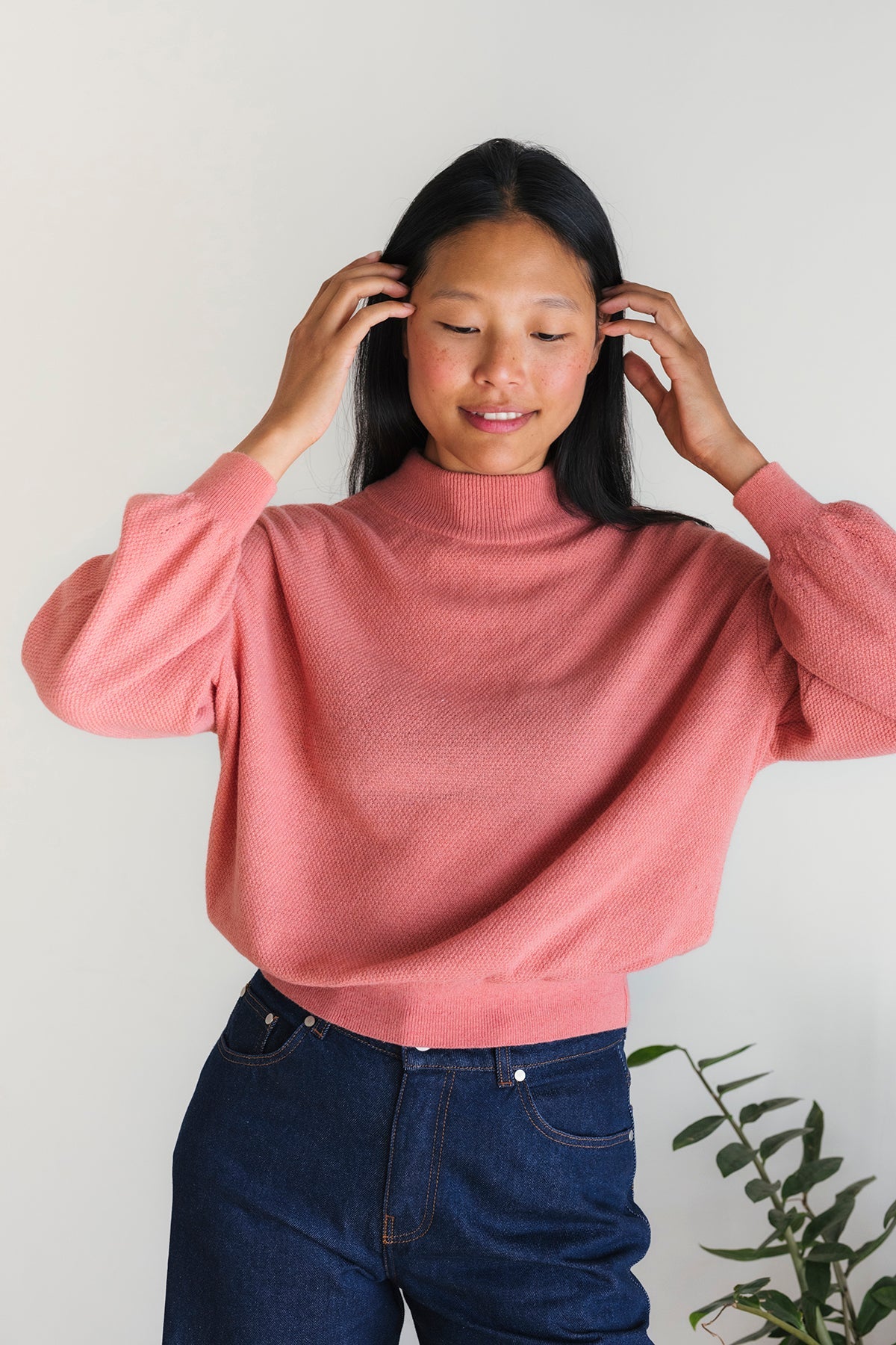 slightly oversized knit falling to the hip