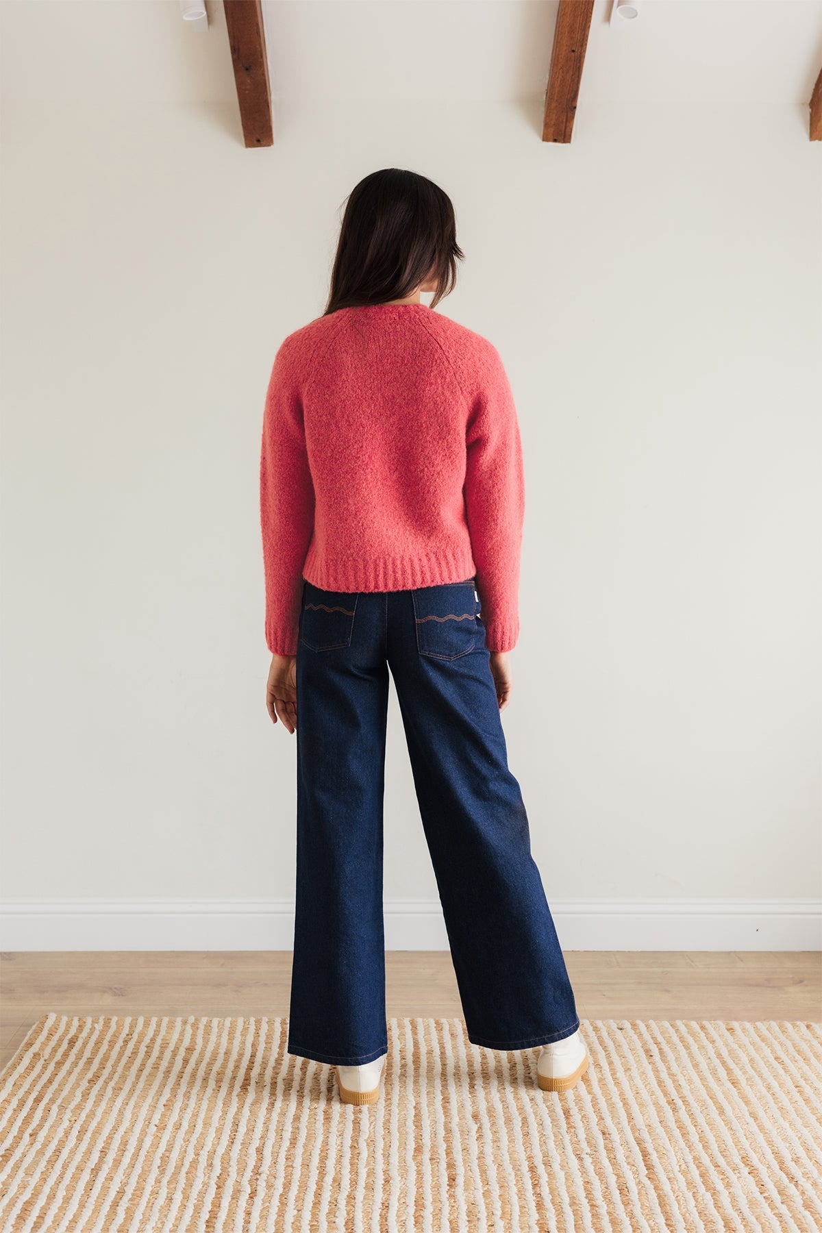 Eco-conscious women’s pink sweater