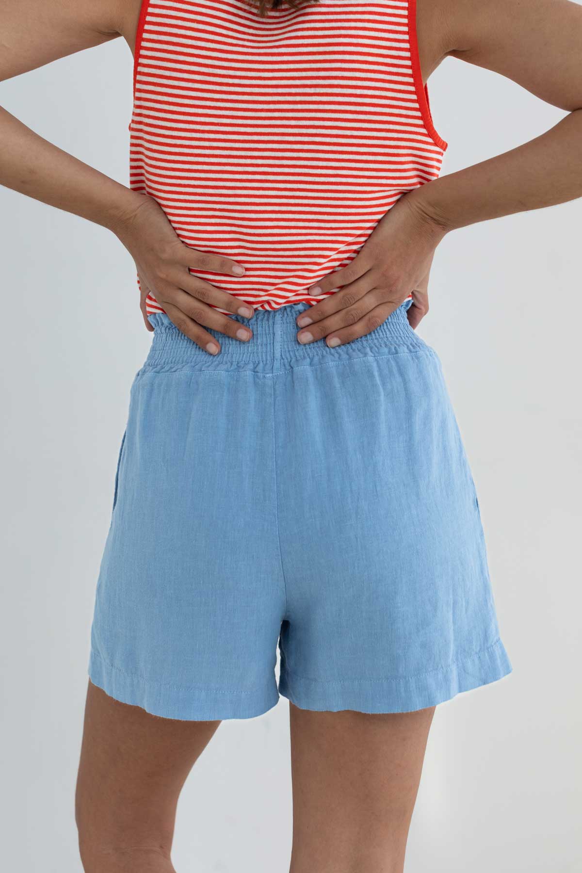 Light linen shorts denim blue women wear view back