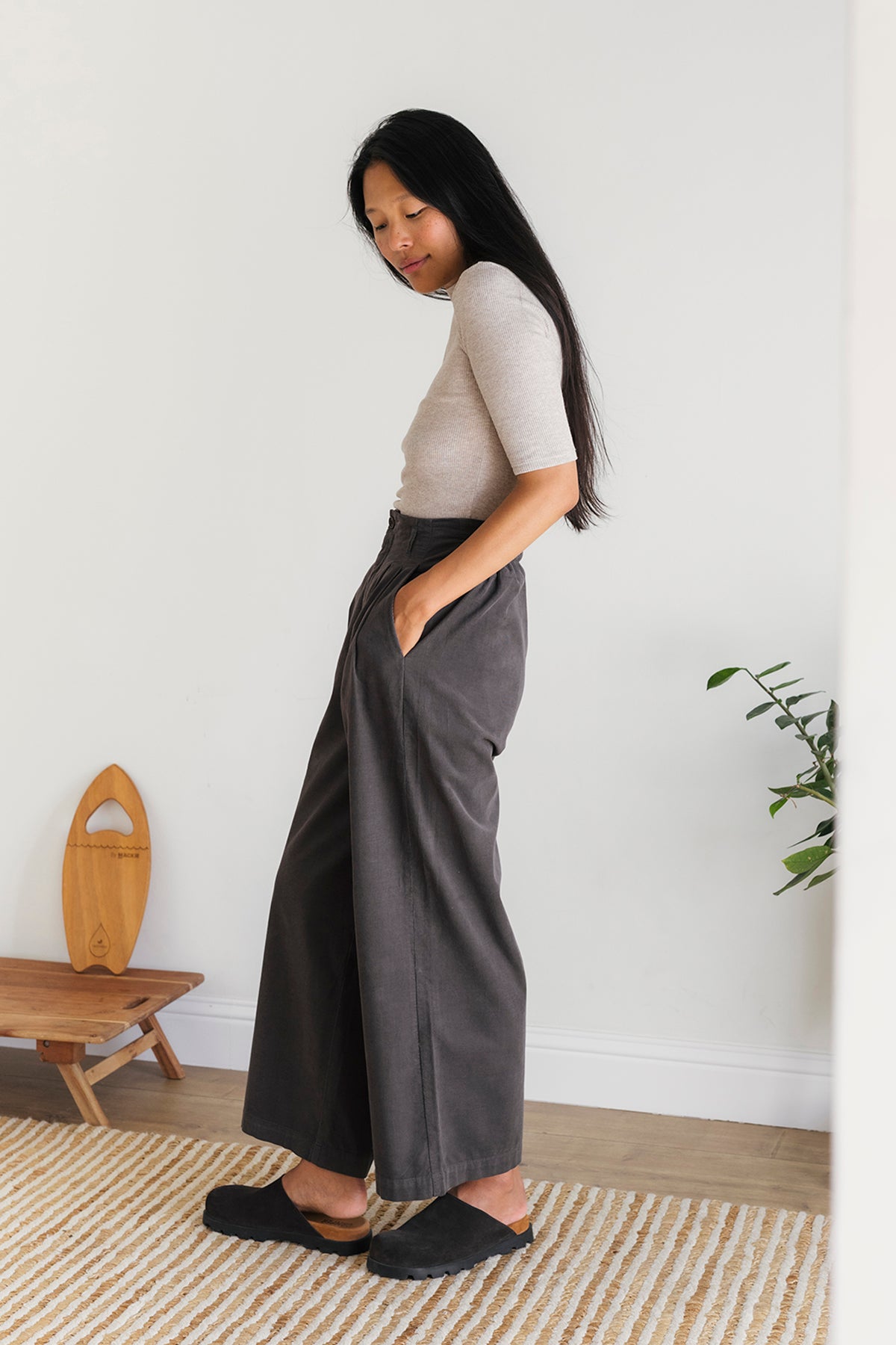 high-waisted grey corduroy trousers