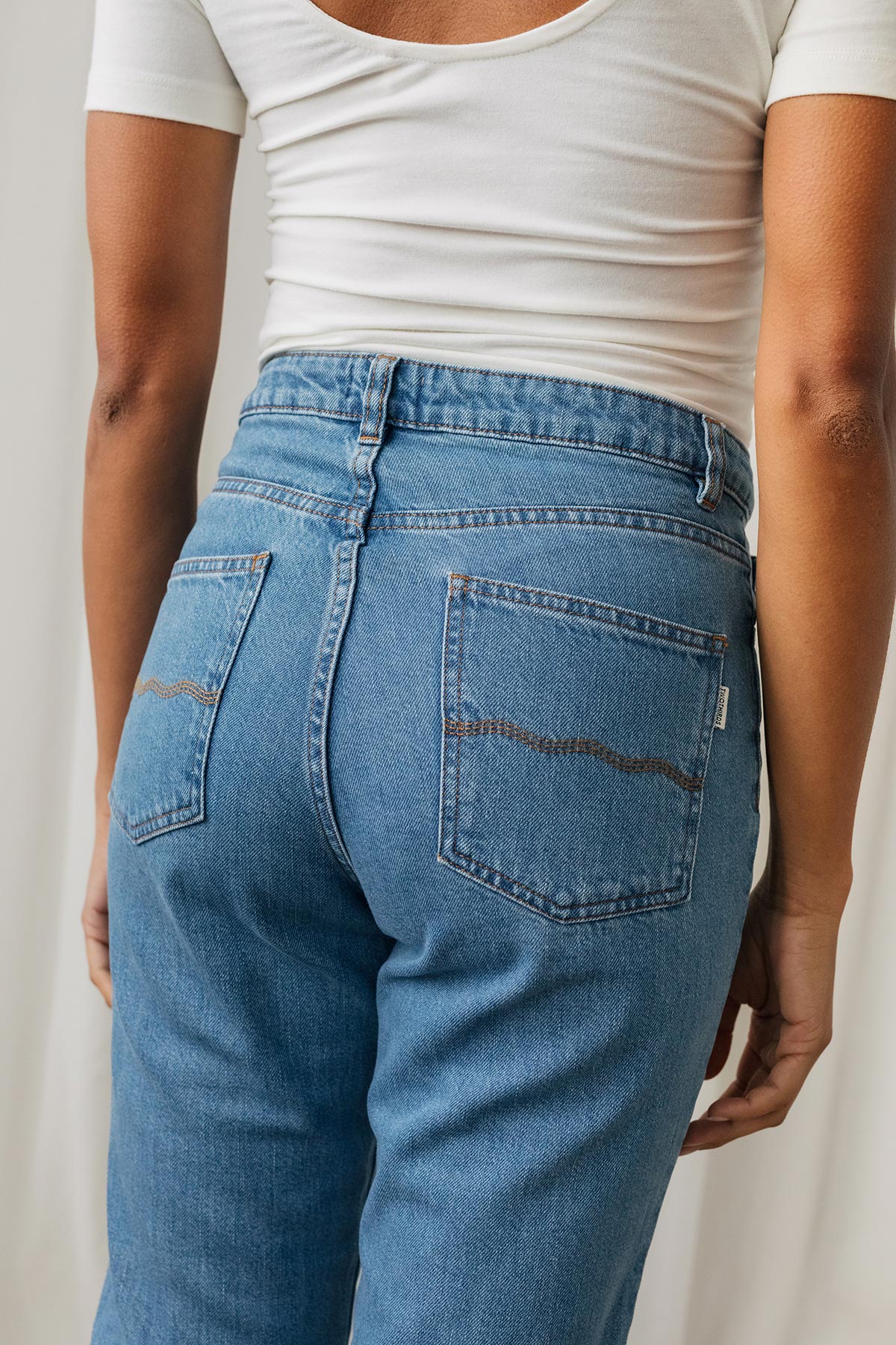 Wave embroidered back pocket jeans