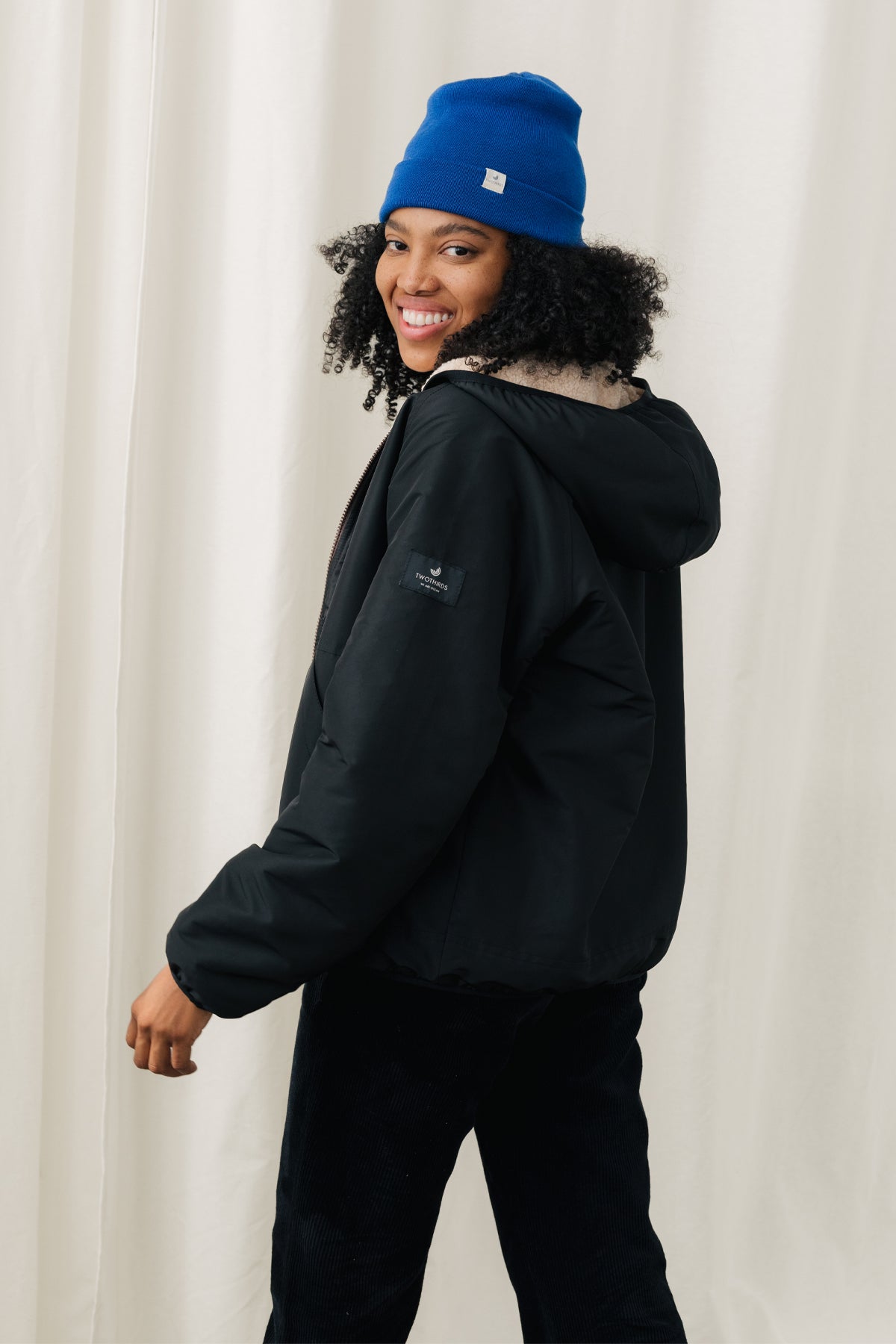 Reversible navy women's technical jacket.