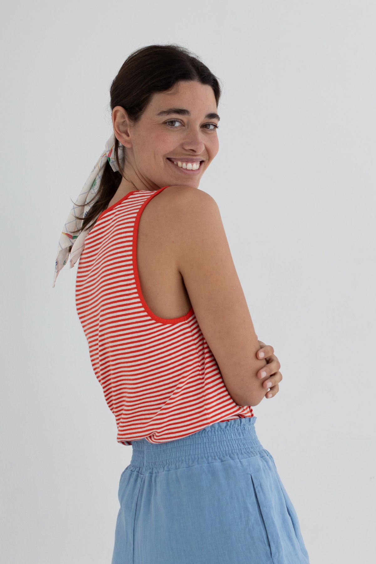 Bright red stripes lightweight vest top women light blue shorts wear view side