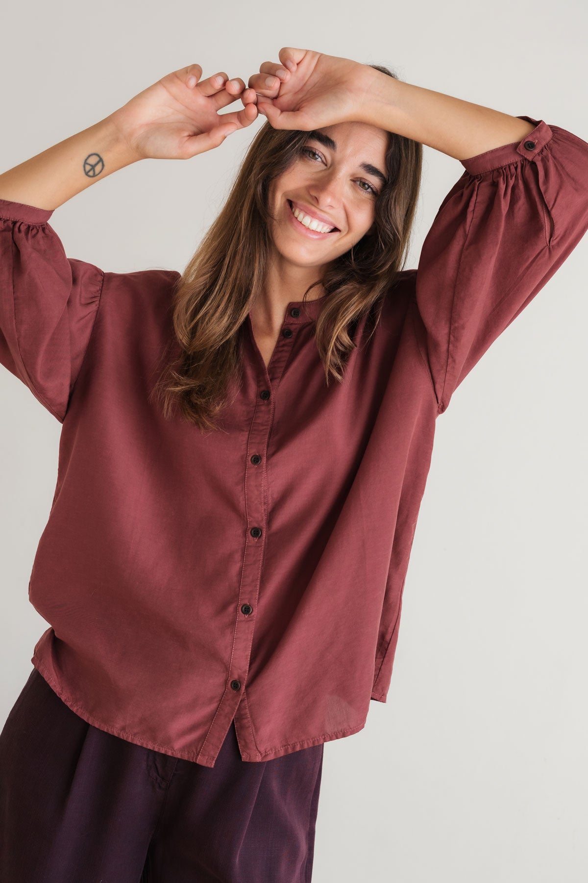 Flowy buttoned burgundy blouse