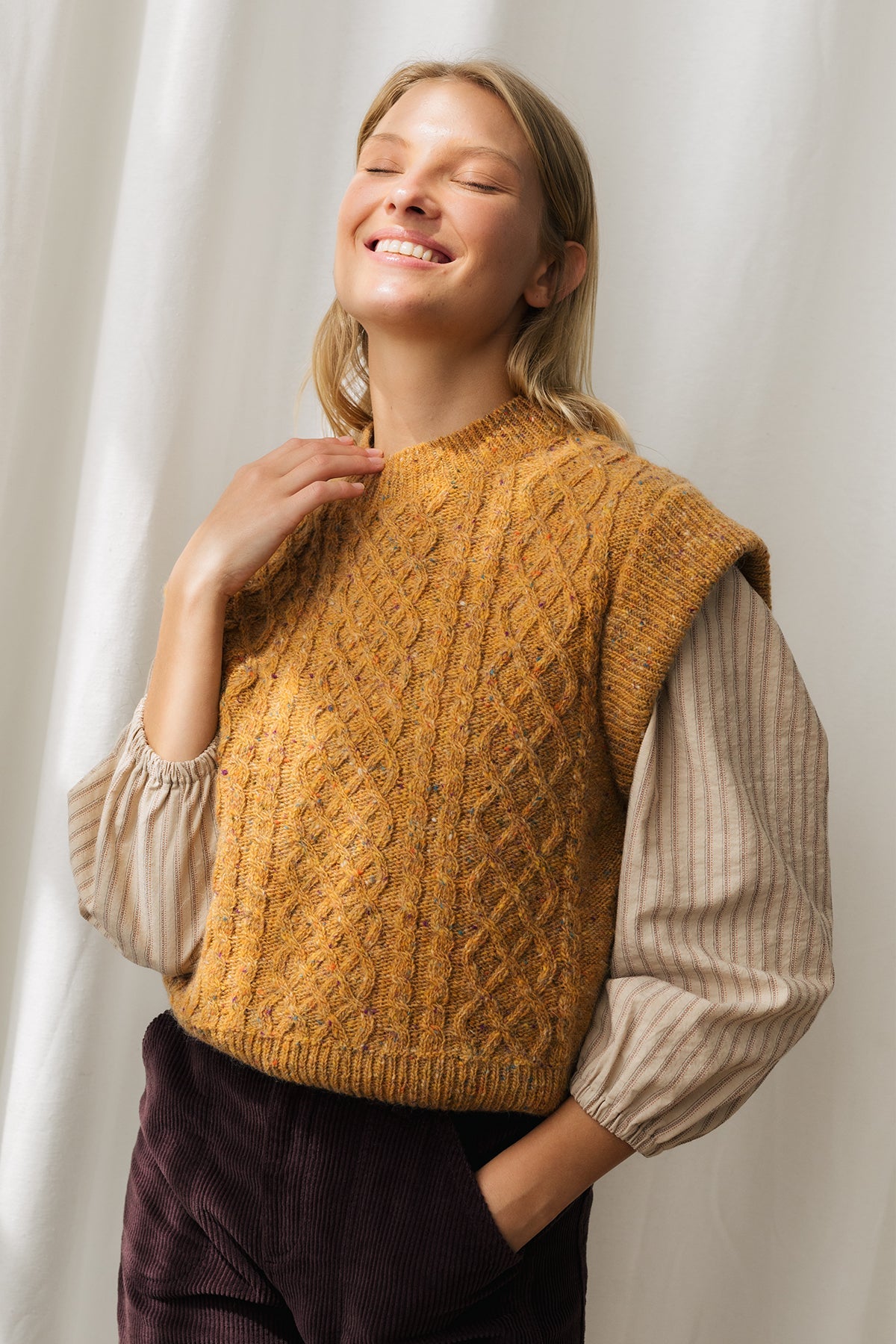 meta-hover, mulesing-free wool knit with ribbed arm holes.