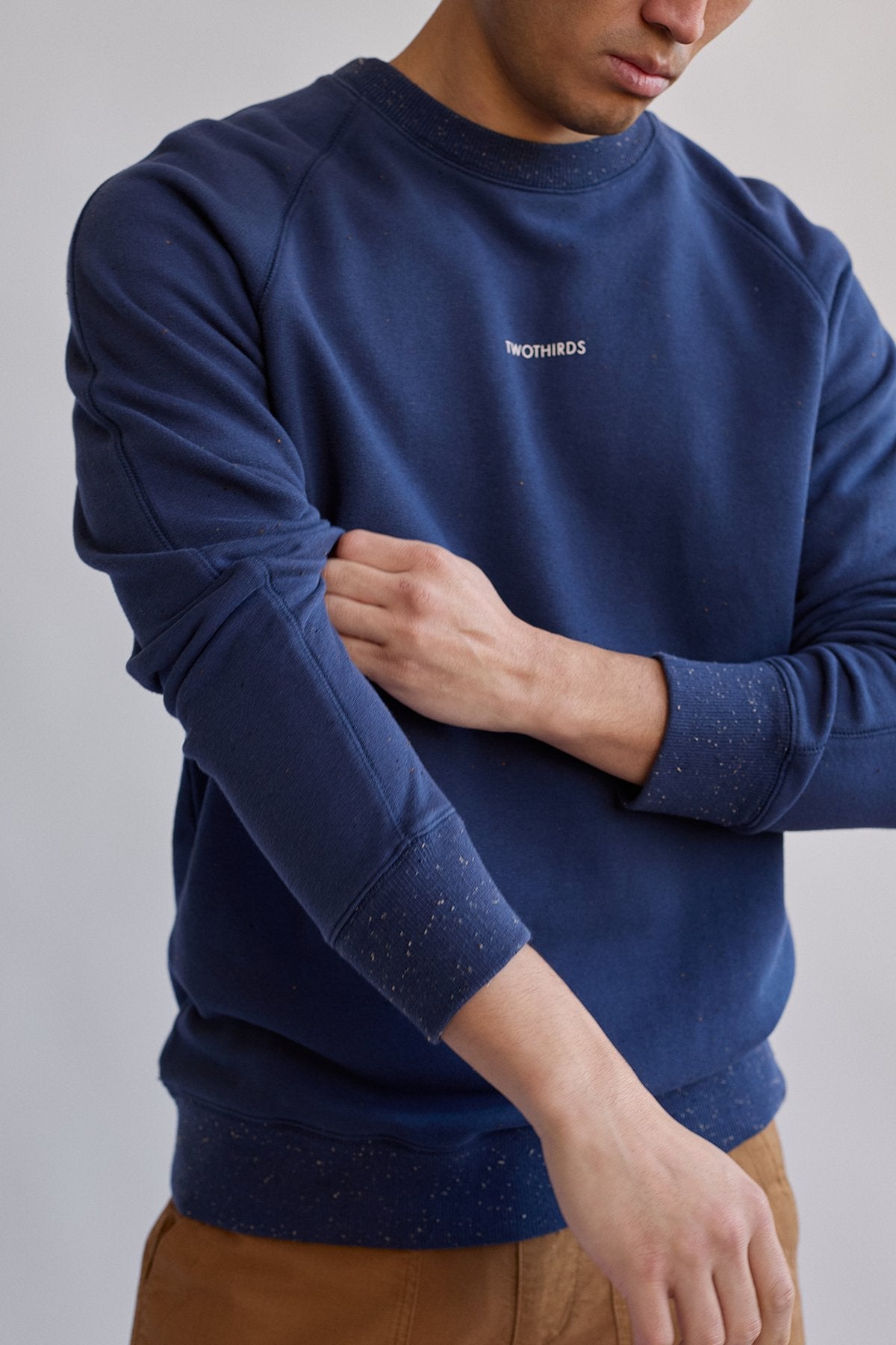 vegan navy sweater with ribbed edges