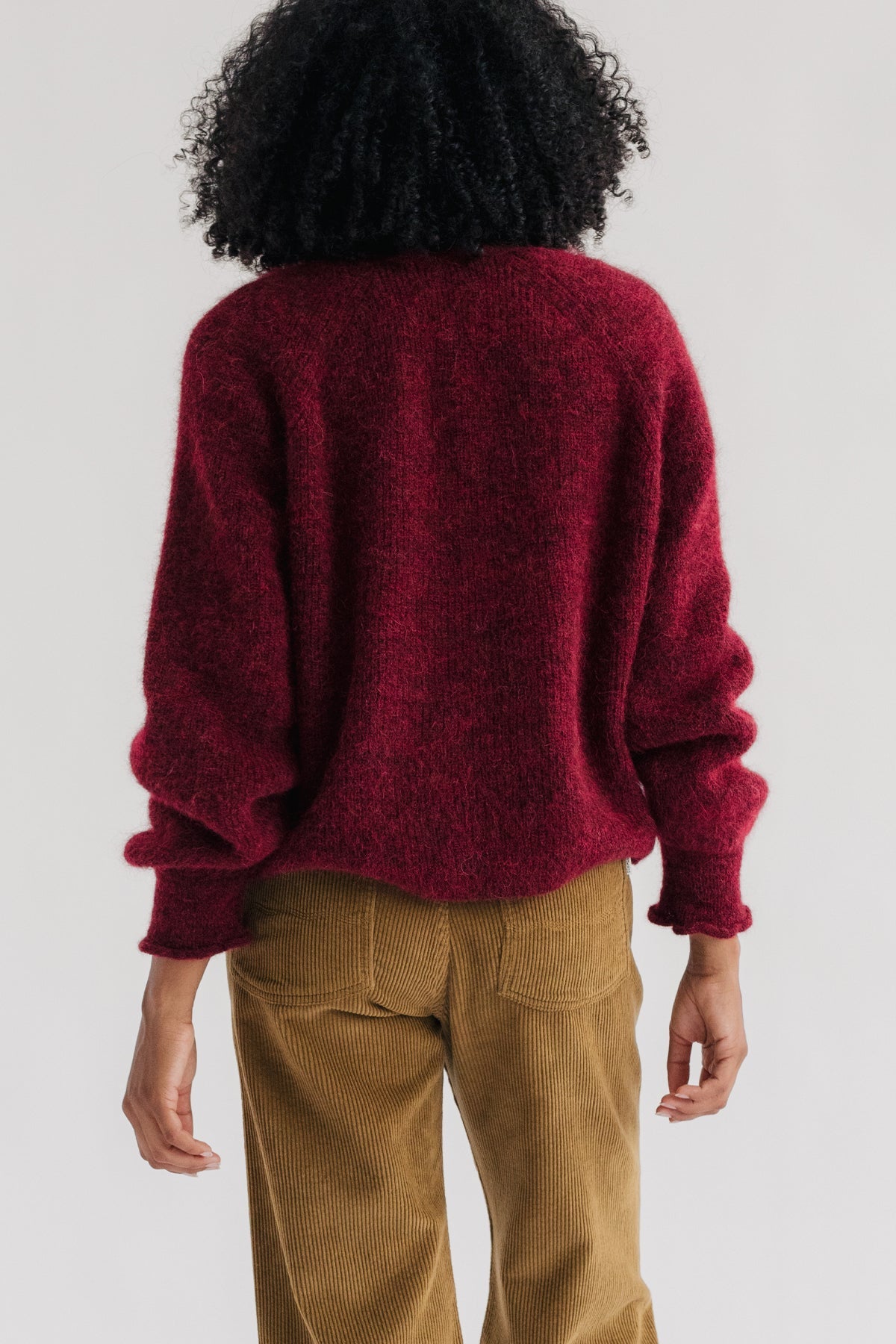 Women Burgundy jacket crafted from organic materials.