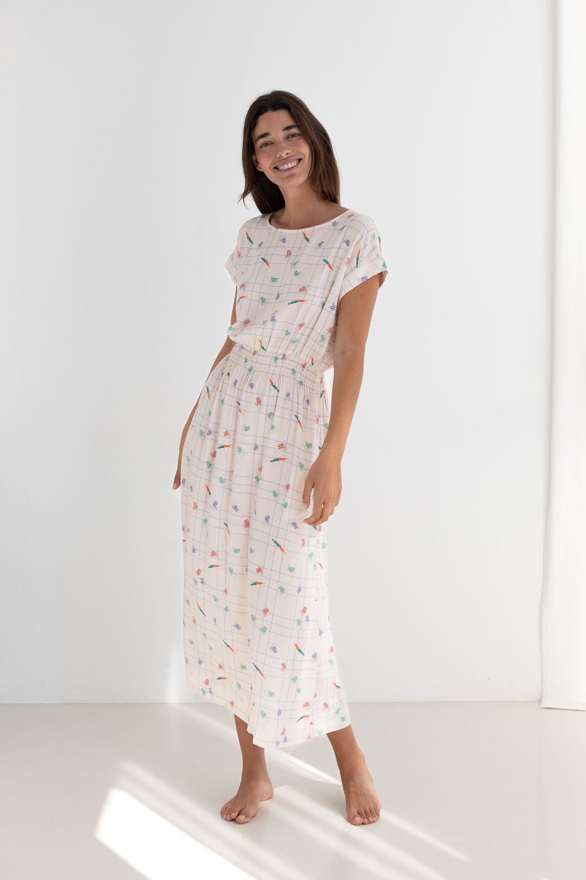 Patterned beige viscose dress women full body view