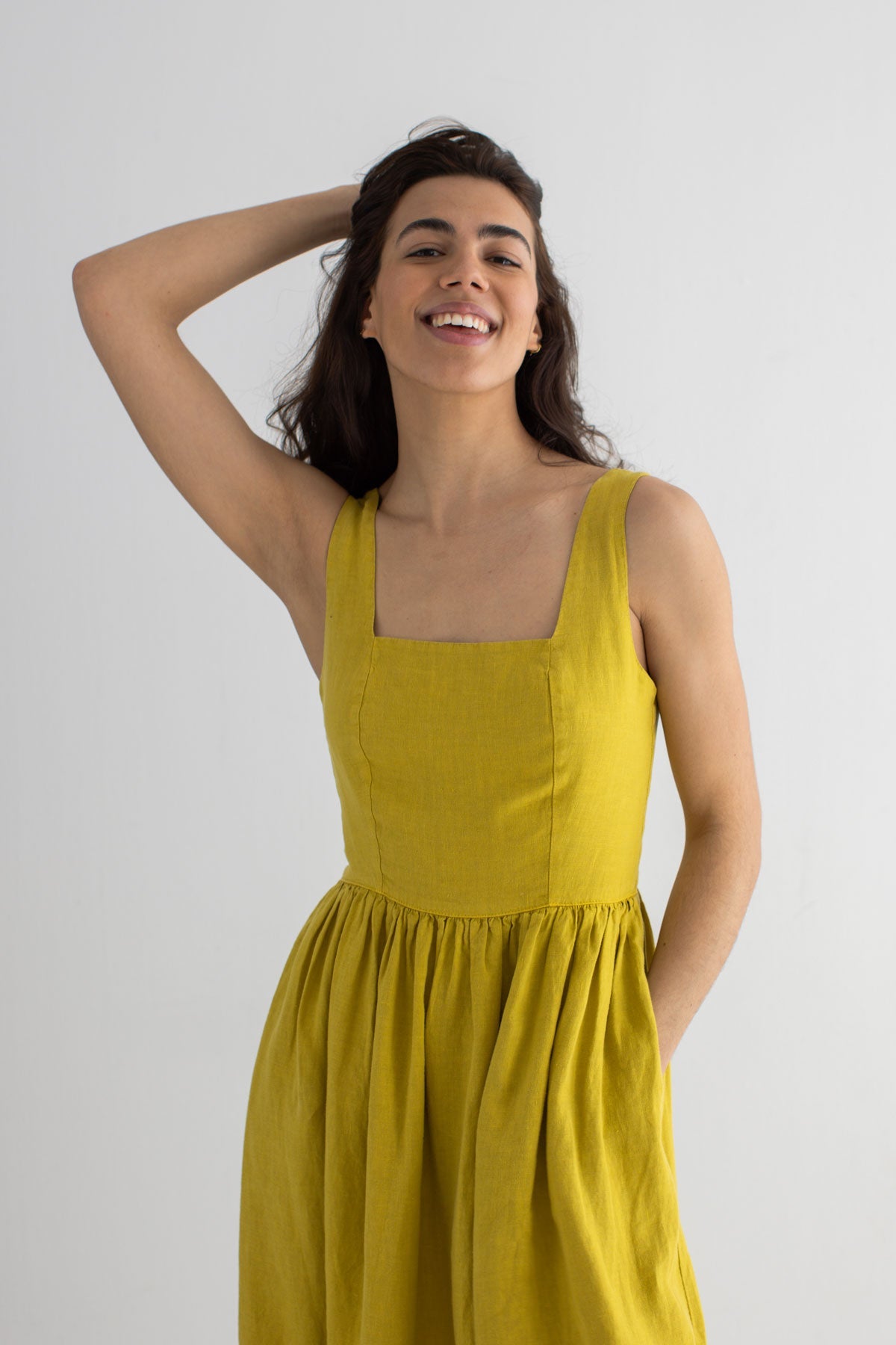 Golden green linen dress women wear view front