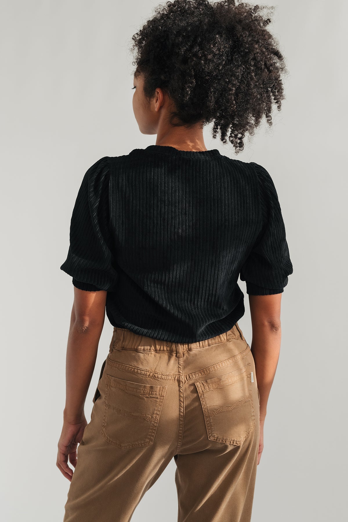 sleeve hem and ribbed texture black top
