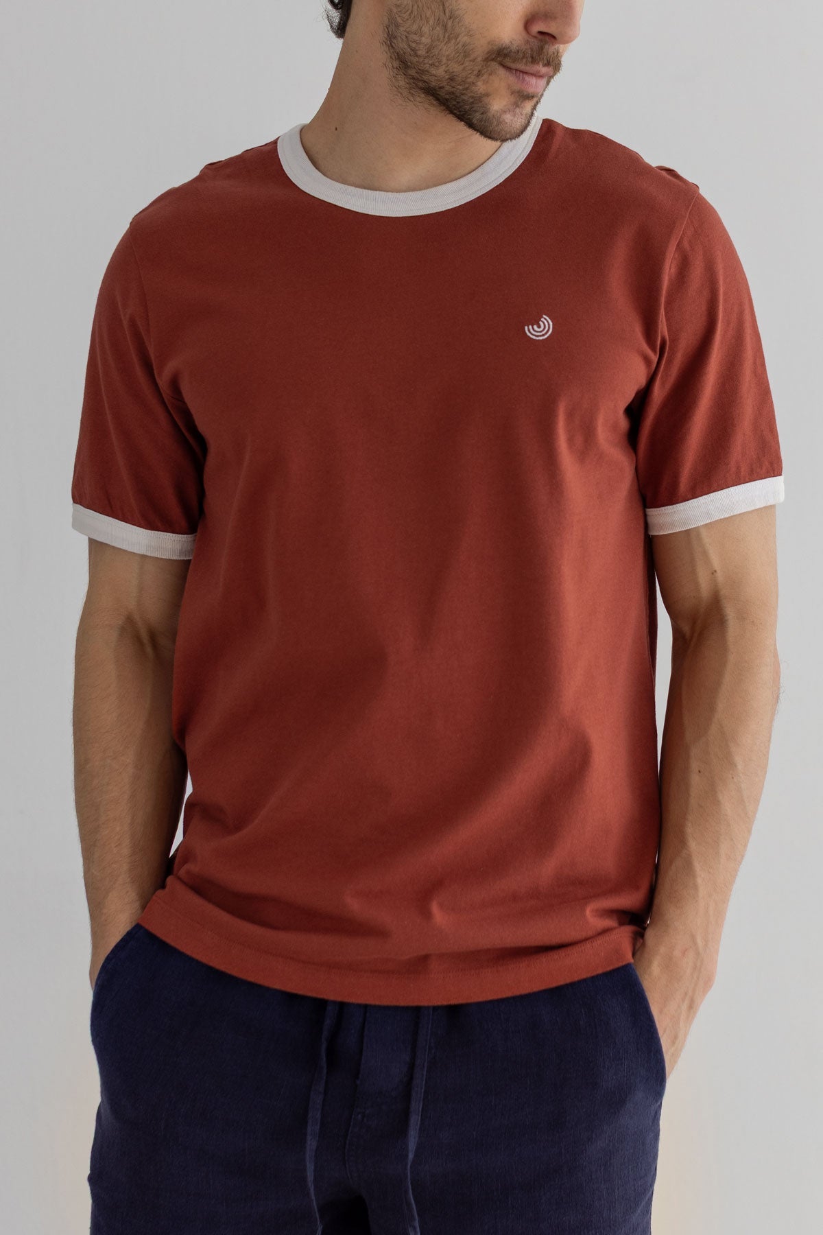Red ochre tshirt men navy pants wear view front