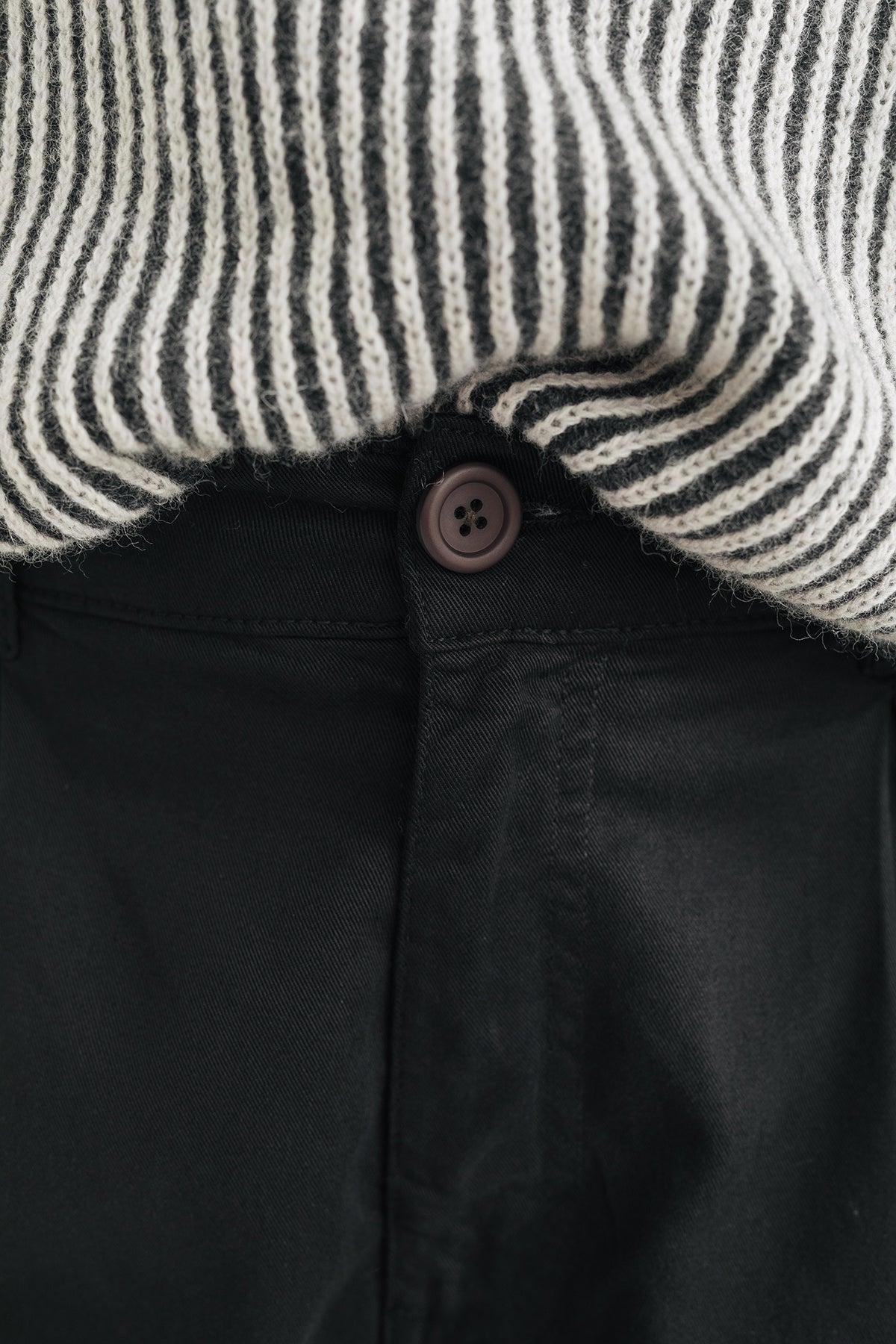 sustainable black pants with corozo buttons