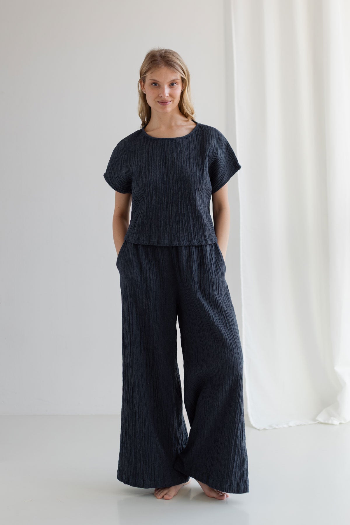 Dusty blue wide leg pants women dusty blue shirt full body view front