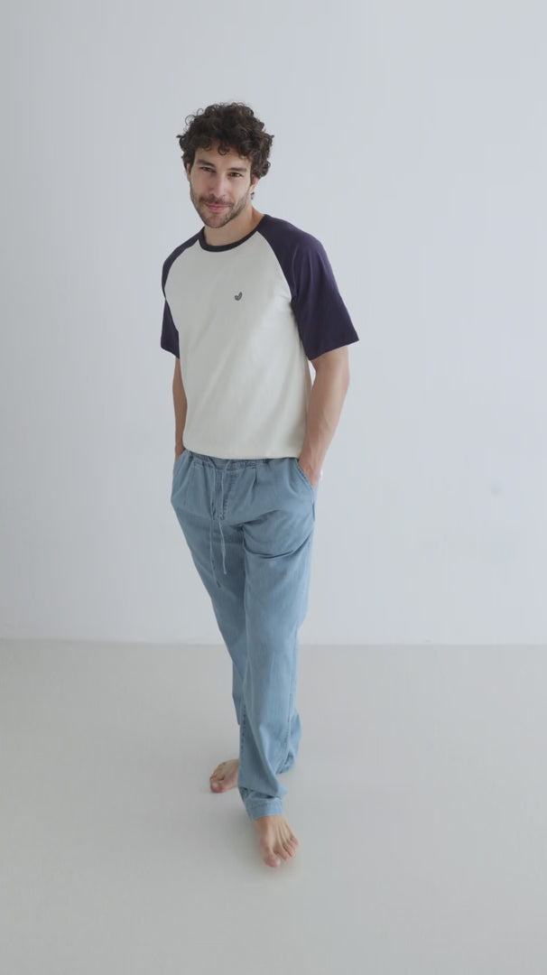 Light blue denim trousers men white blue tshirt full body view 