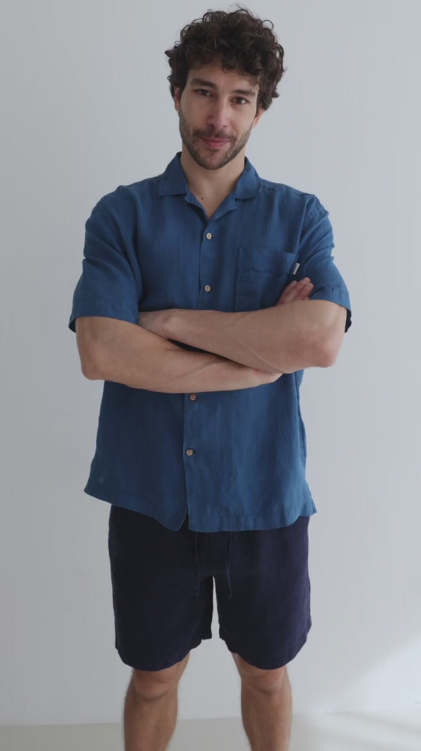 Navy blue heavy linen shorts men blue shirt full body view