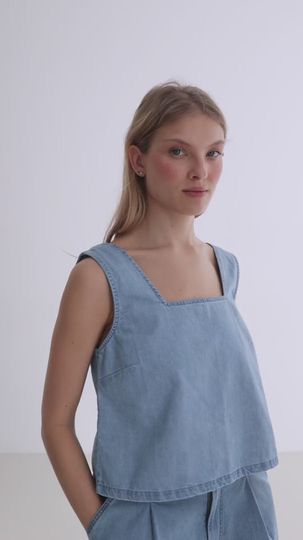 Light blue denim shirt women denim trousers full body view