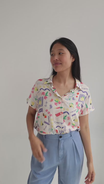 Patterned light weight shirt women light blue pants full body view 