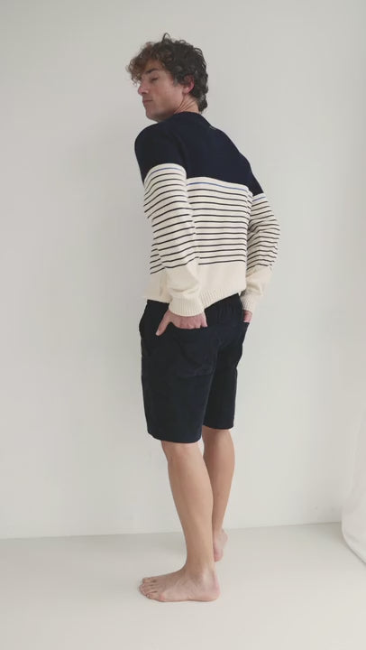 dark navy micro corduroy shorts men striped sweater full body view