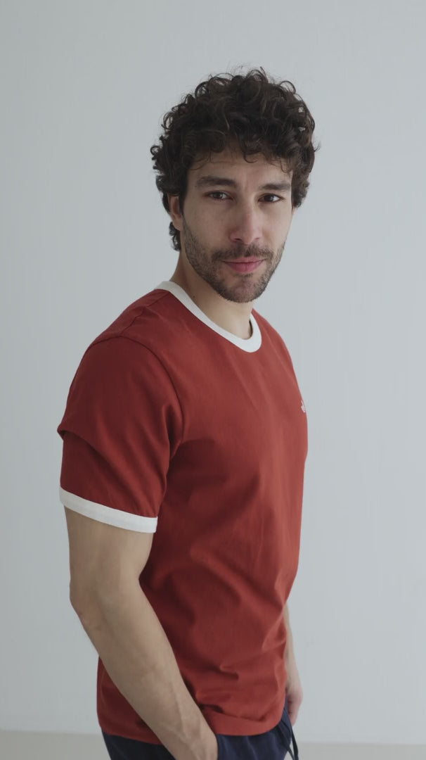 Red ochre tshirt men navy shorts full body view
