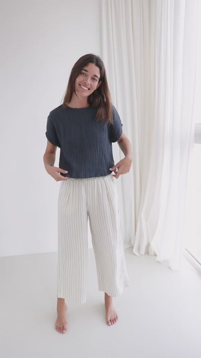 Dusty blue Bambula shirt women striped pants full body view